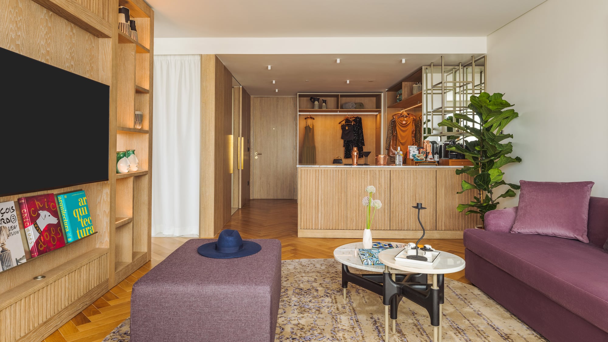 a living room with a couch and a tv