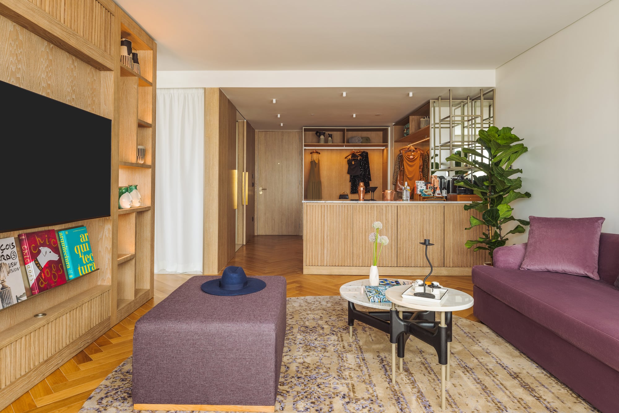 a living room with a couch and a tv