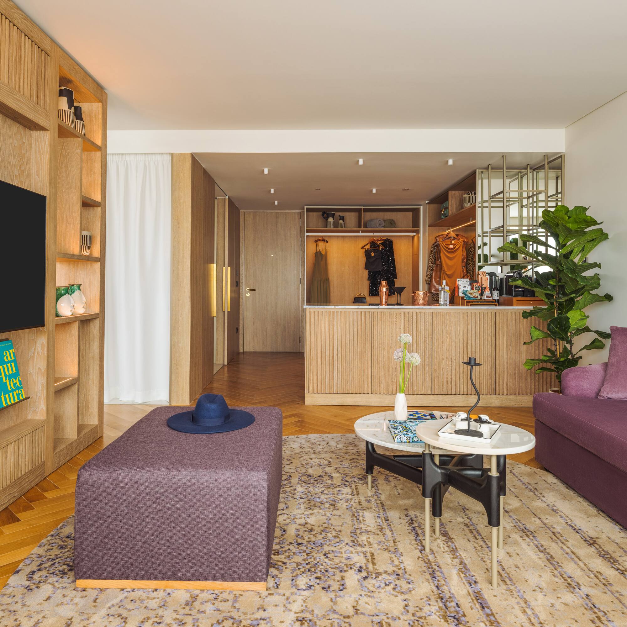 a living room with a couch and a tv