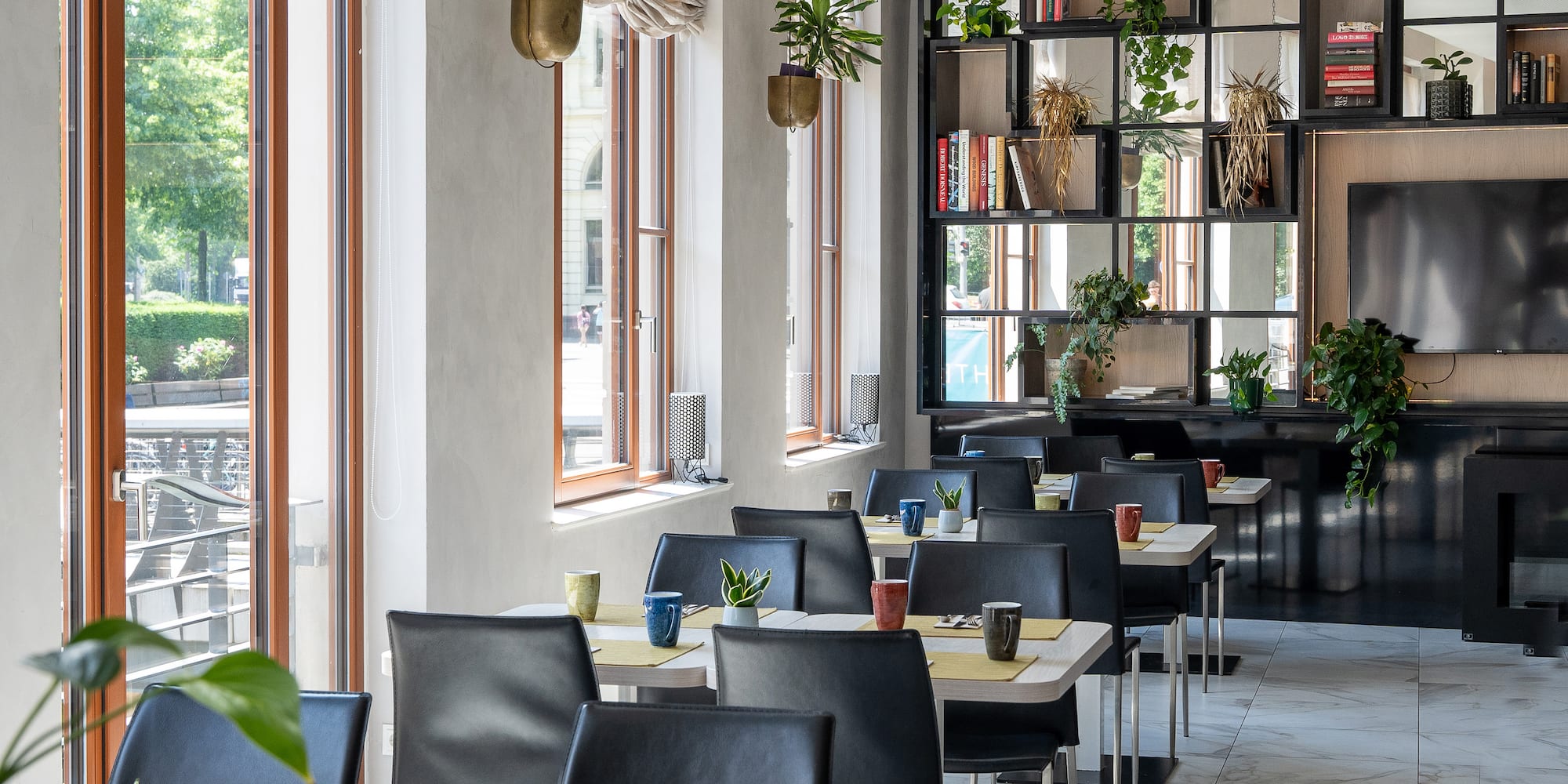 a room with tables and chairs