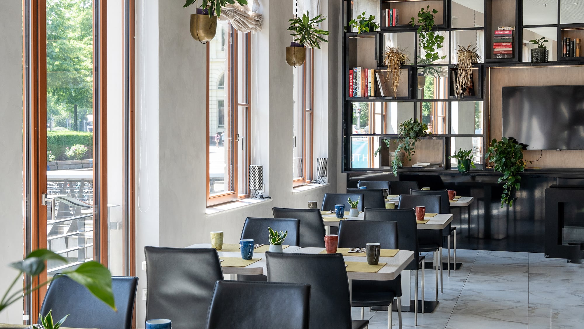 a room with tables and chairs