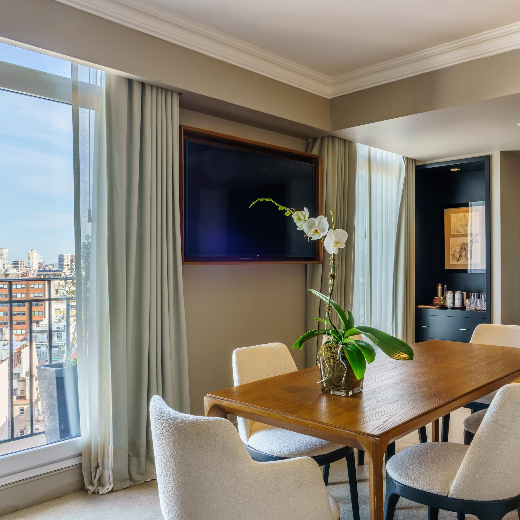 a room with a table and chairs