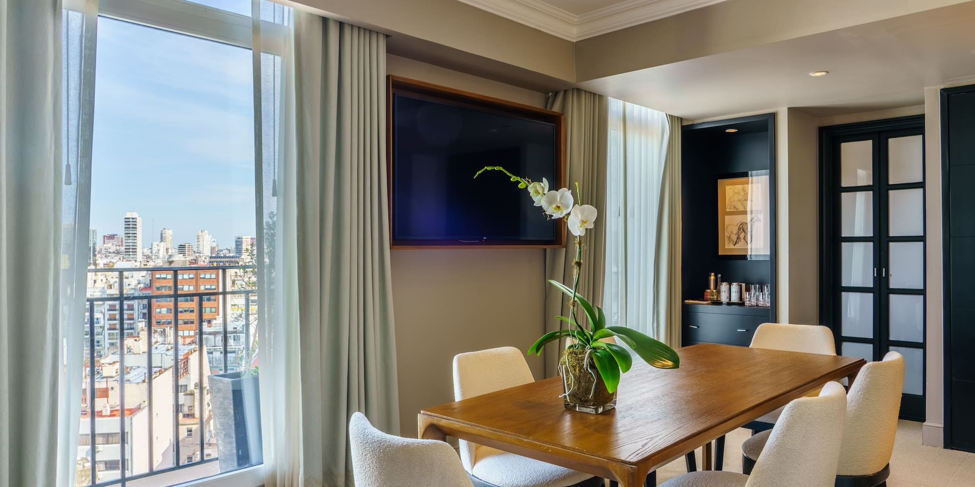 a room with a table and chairs