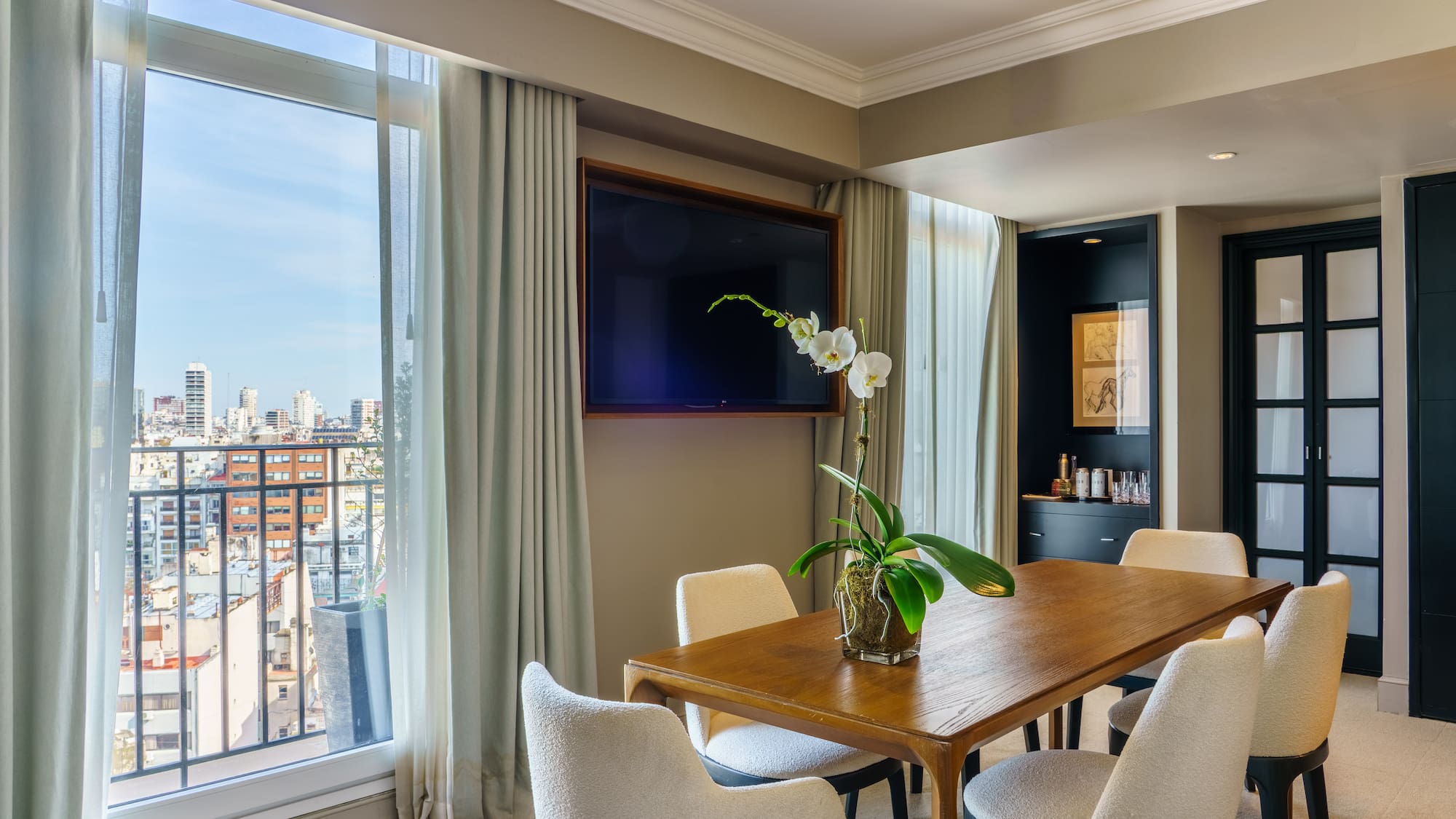 a room with a table and chairs