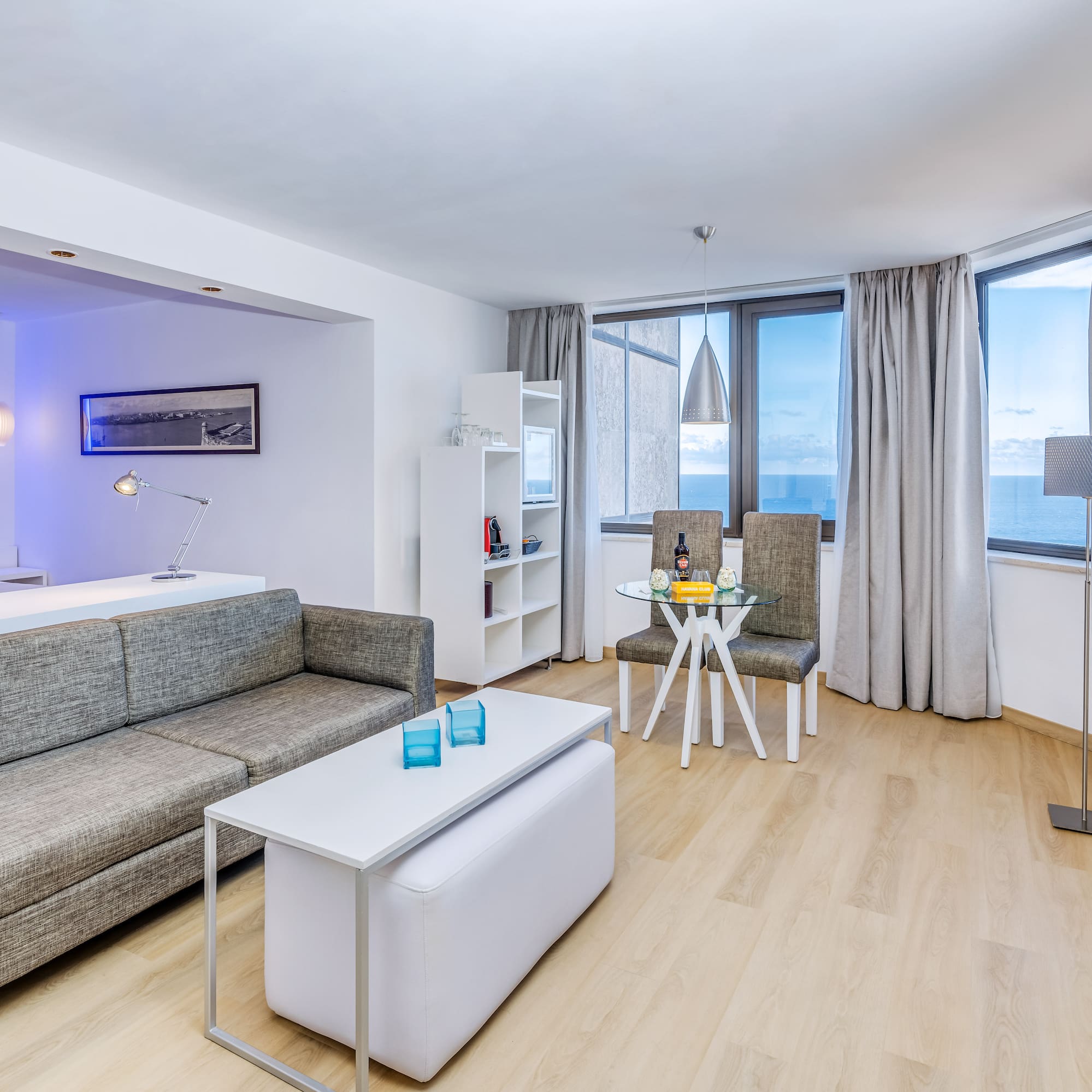 a living room with a couch and a table