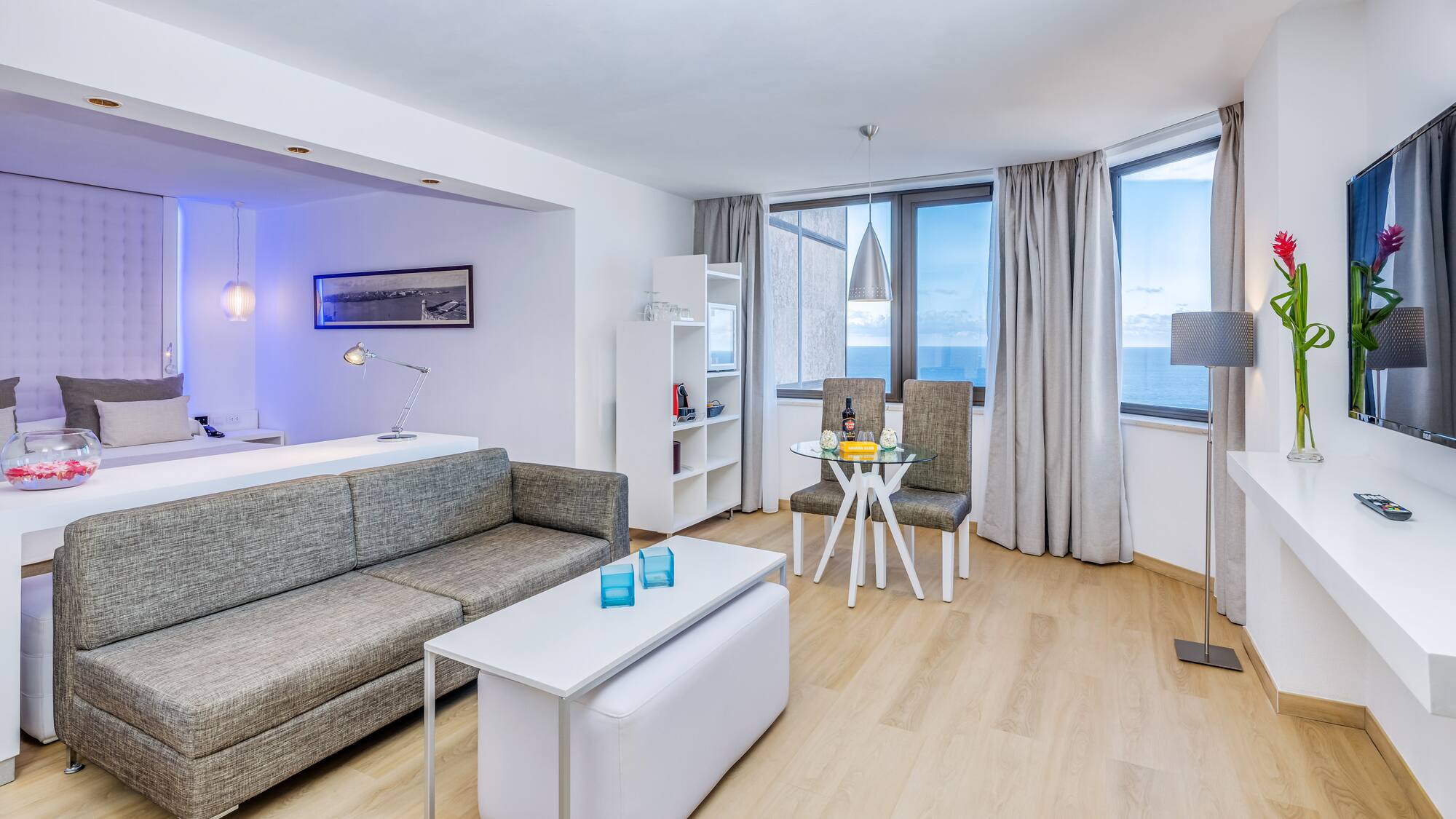 a living room with a couch and a table