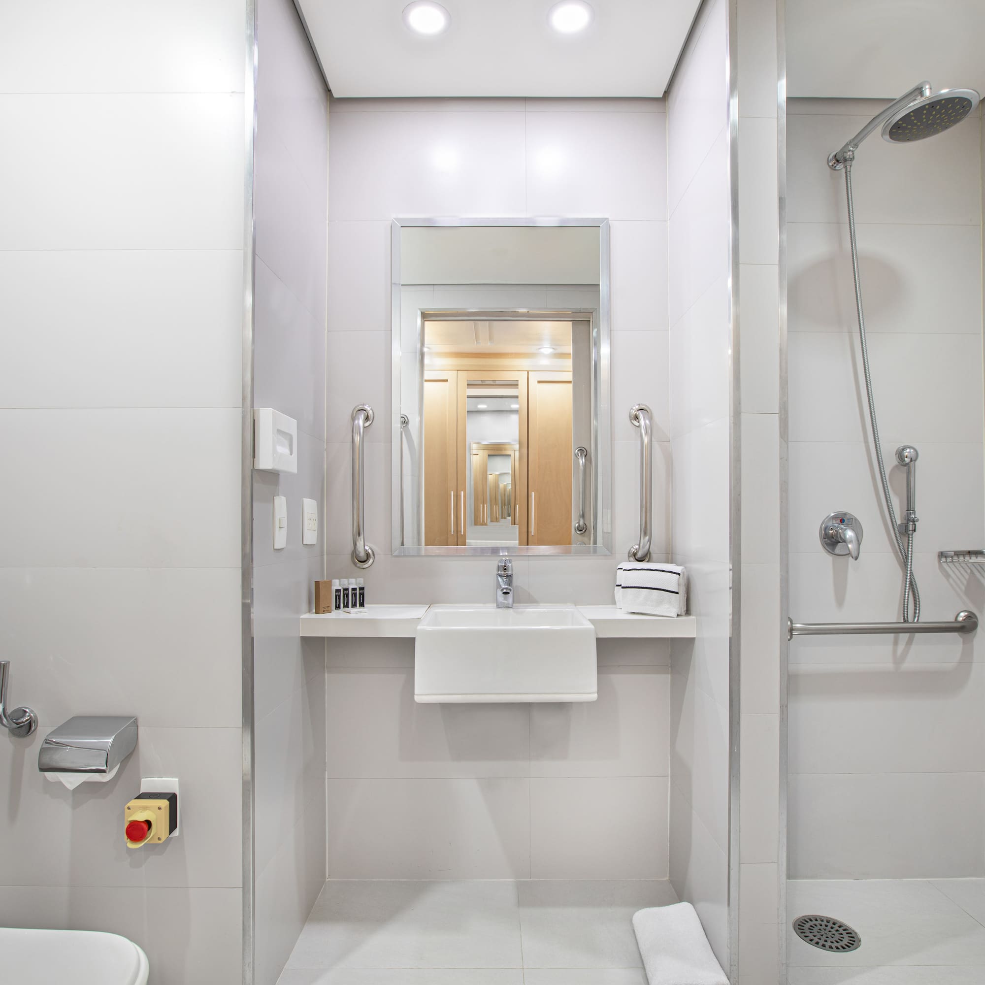 a bathroom with a shower and sink