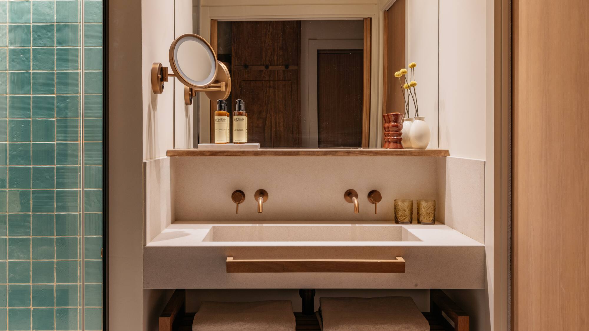 a bathroom with a mirror and sink