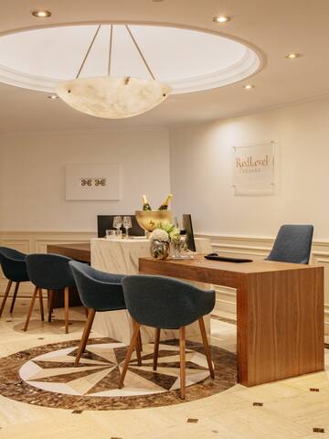 a room with a table and chairs