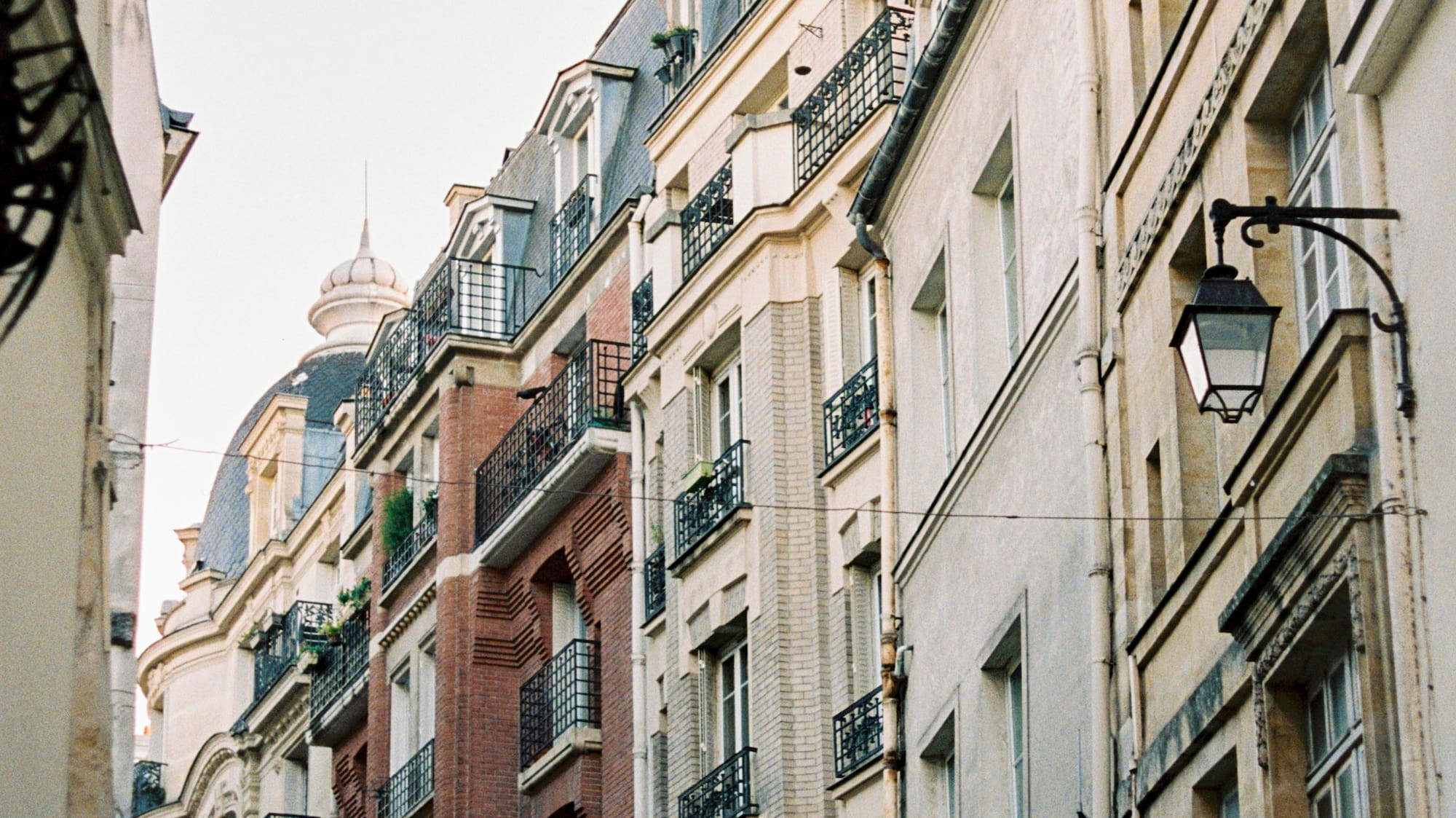 a group of buildings with balconies