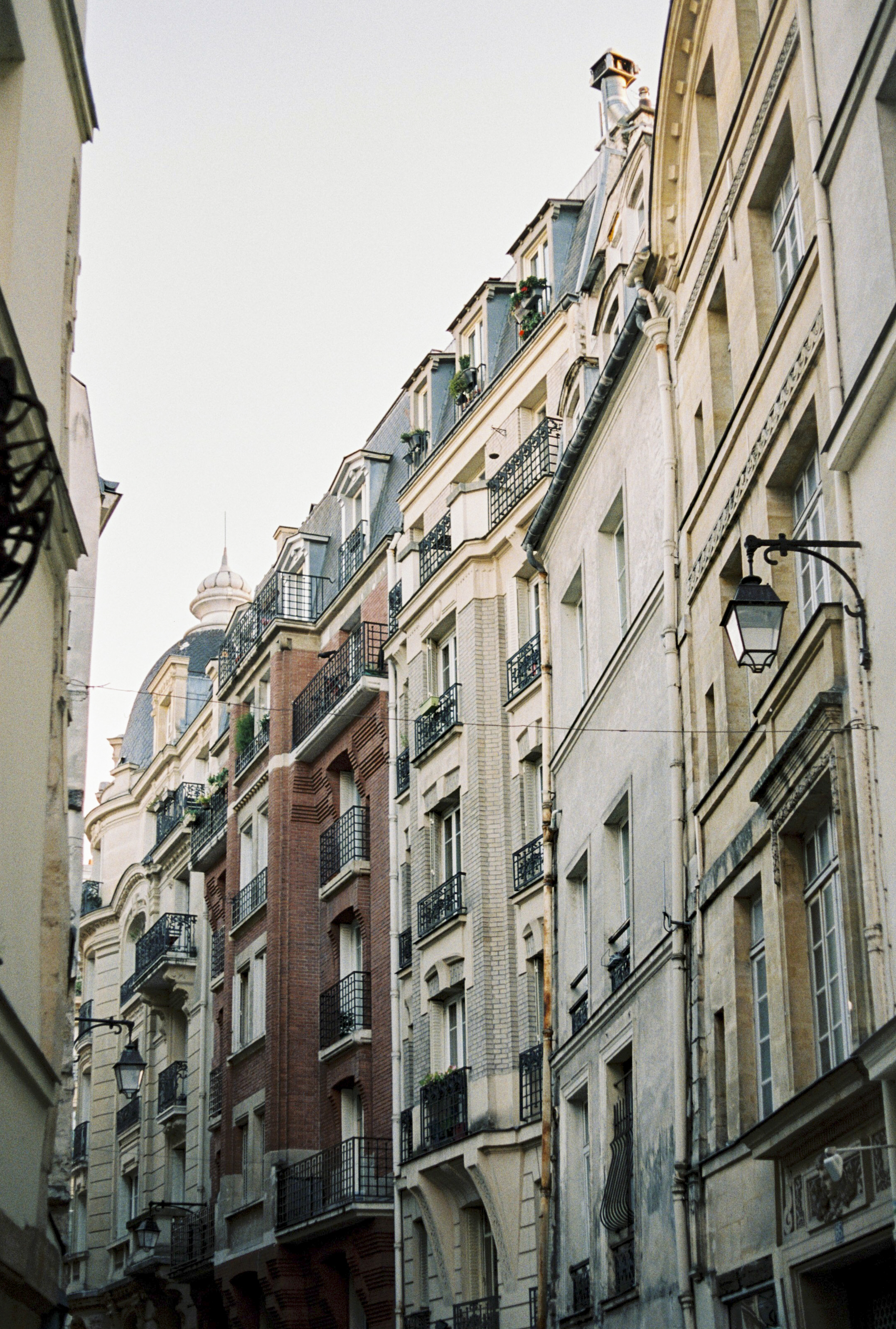 a group of buildings with balconies