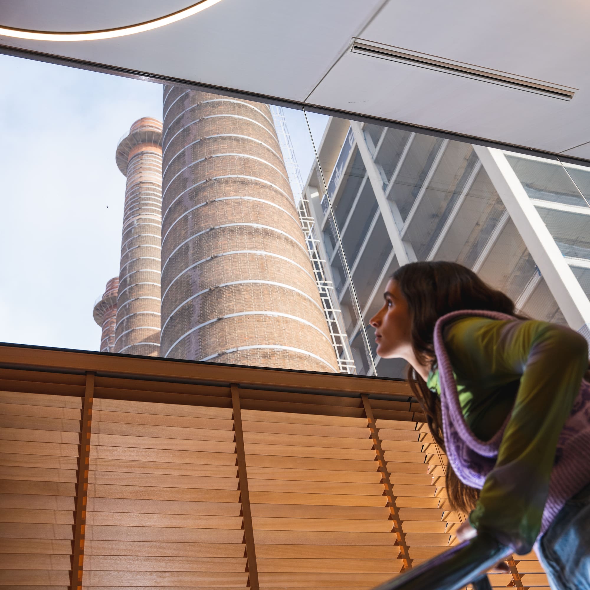 a woman looking out a window