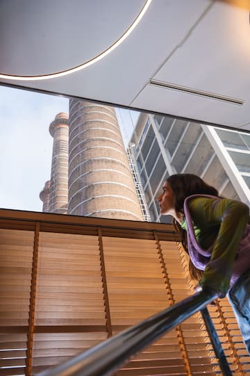 a woman looking out a window