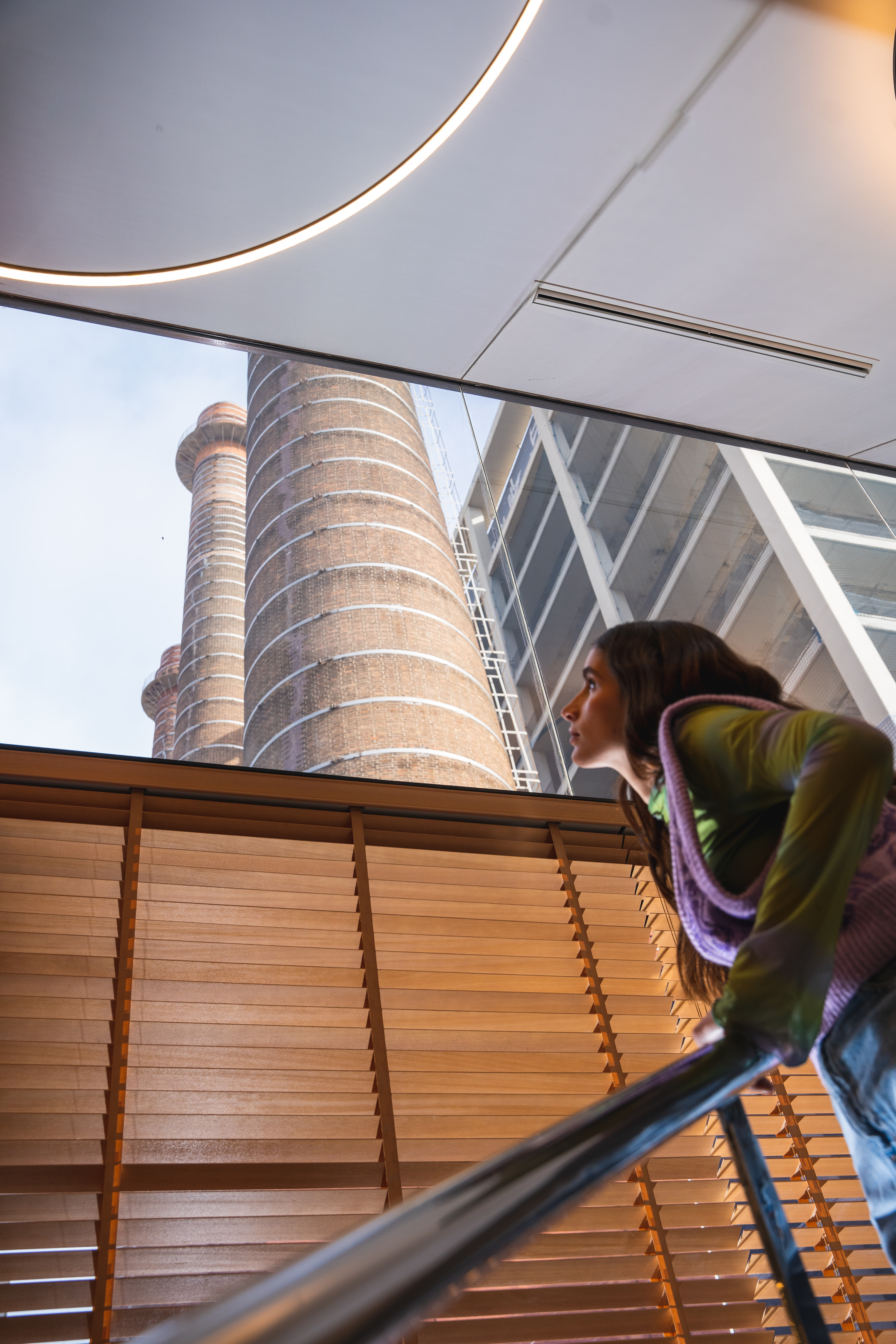 a woman looking out a window