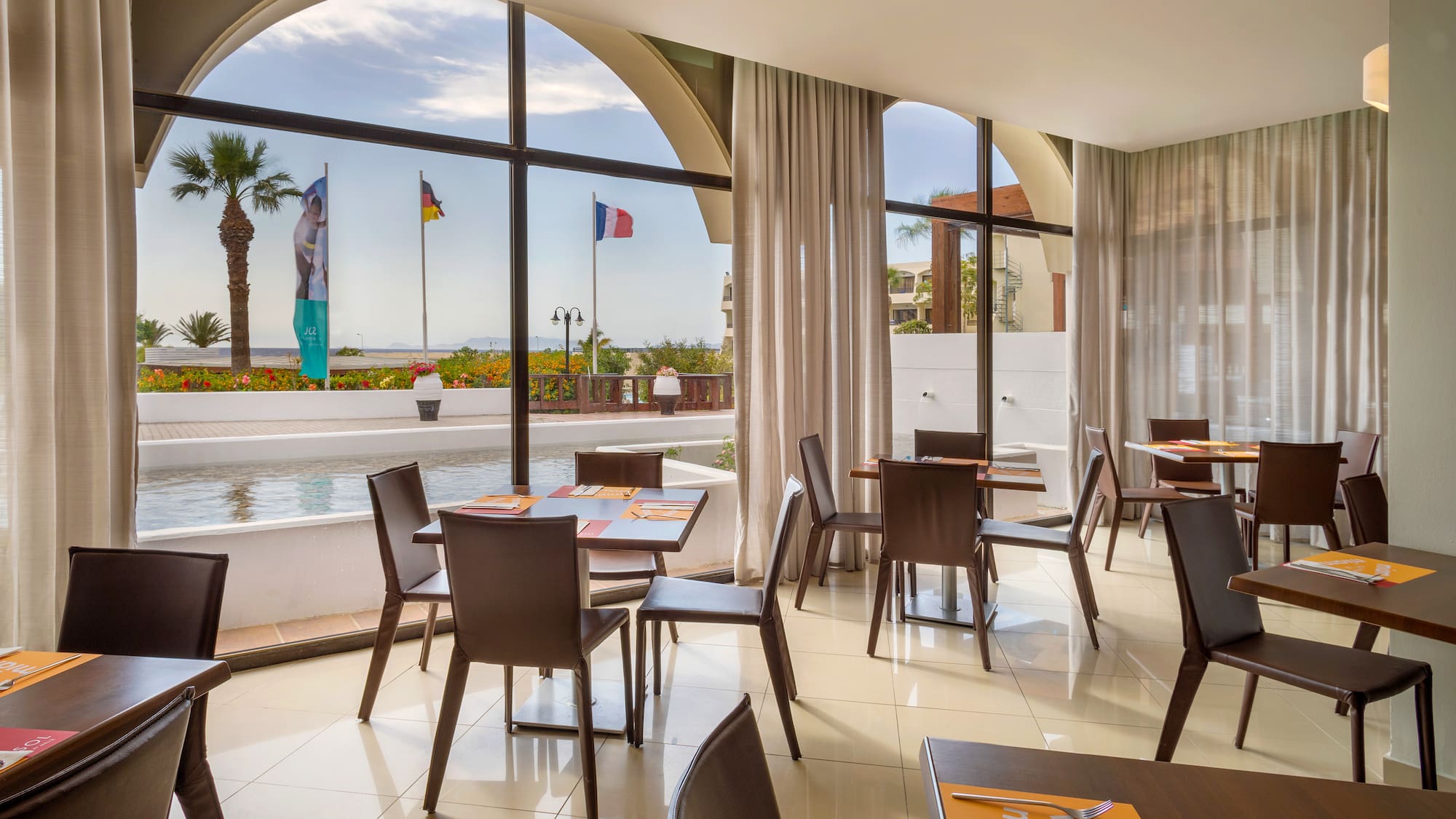 a room with tables and chairs