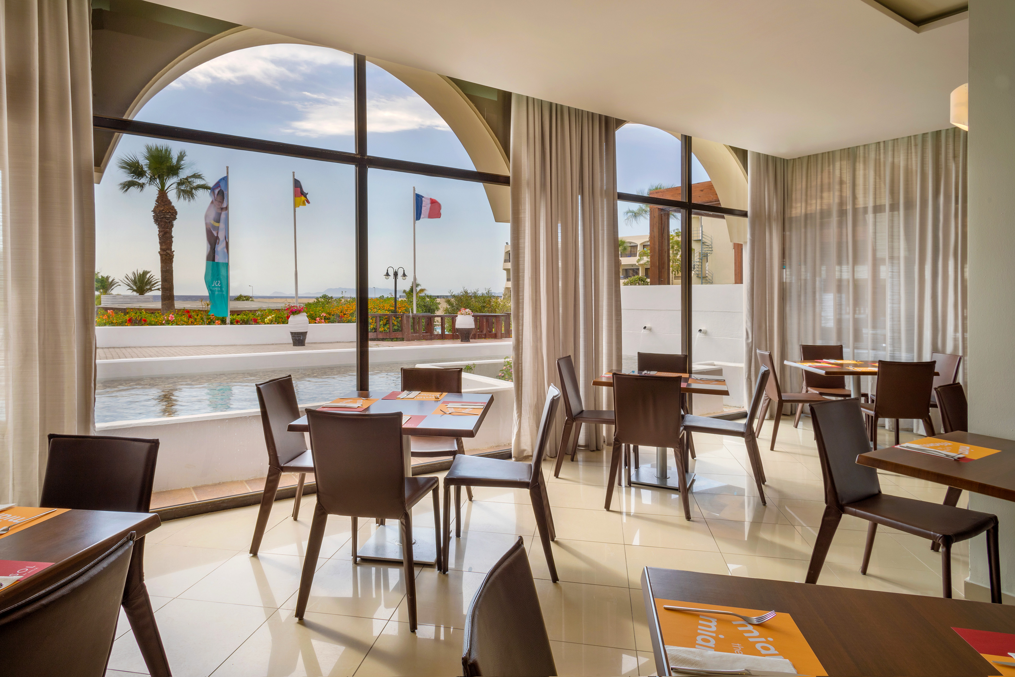 a room with tables and chairs