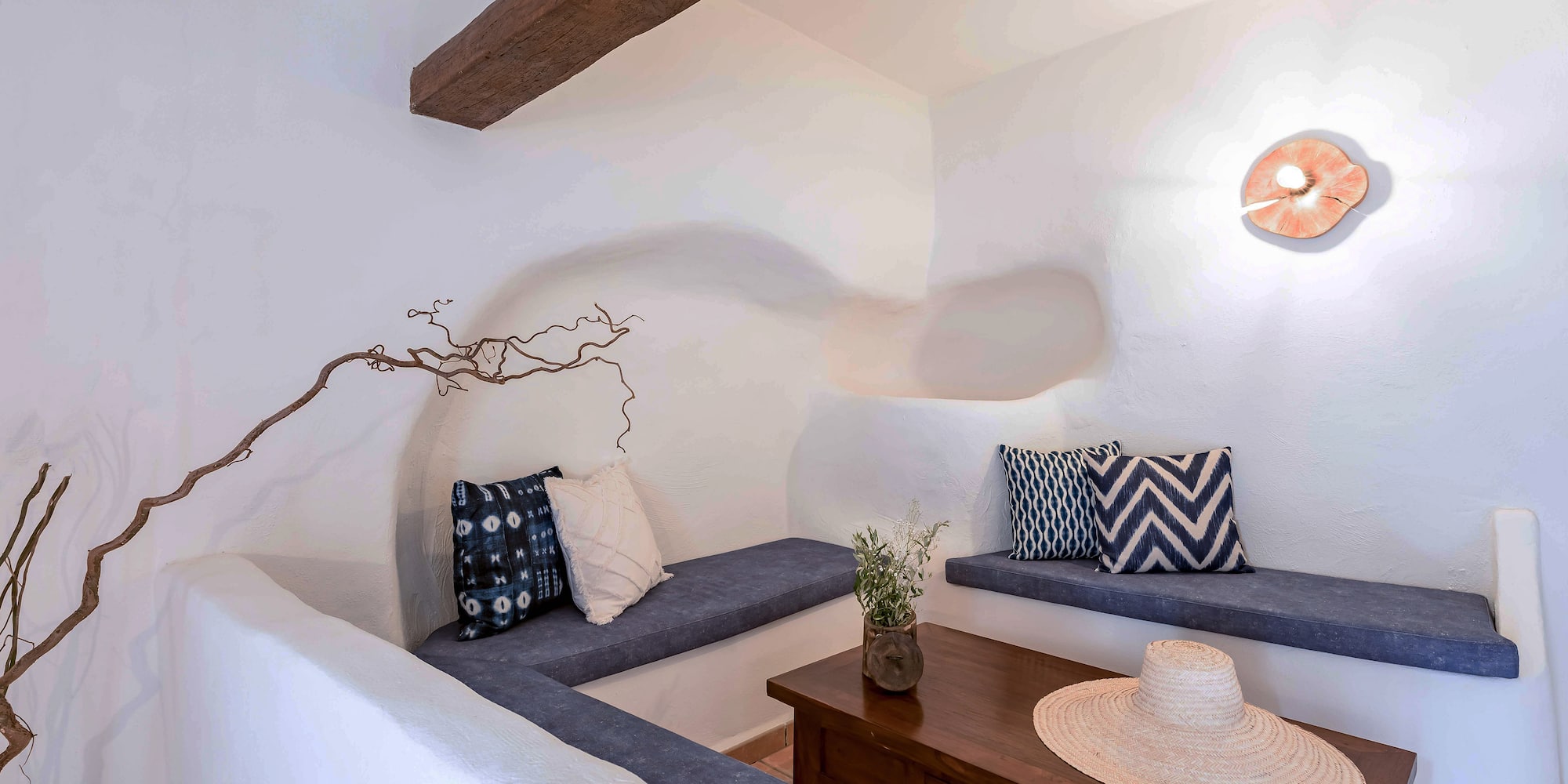 a room with a table and benches