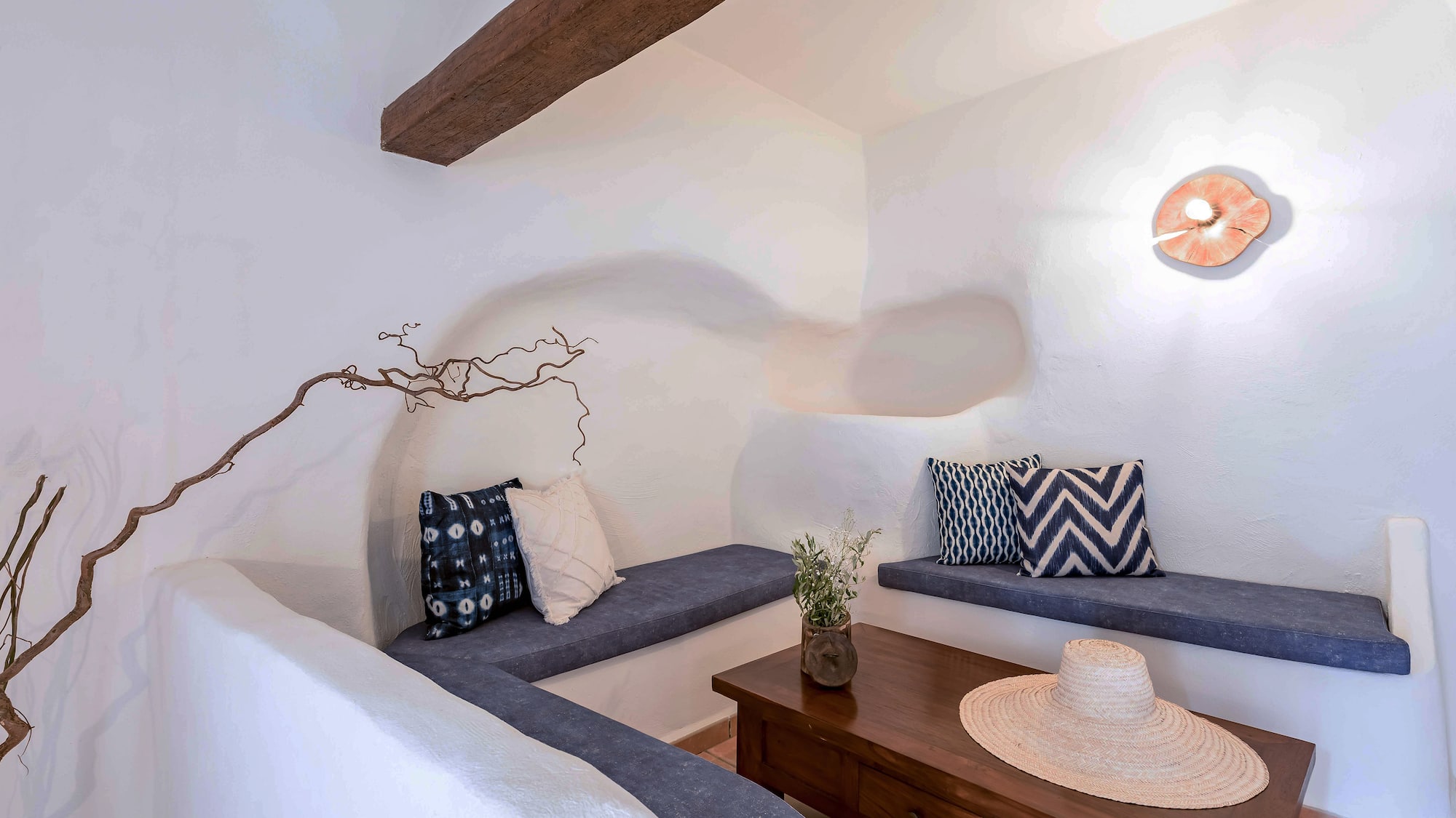 a room with a table and benches