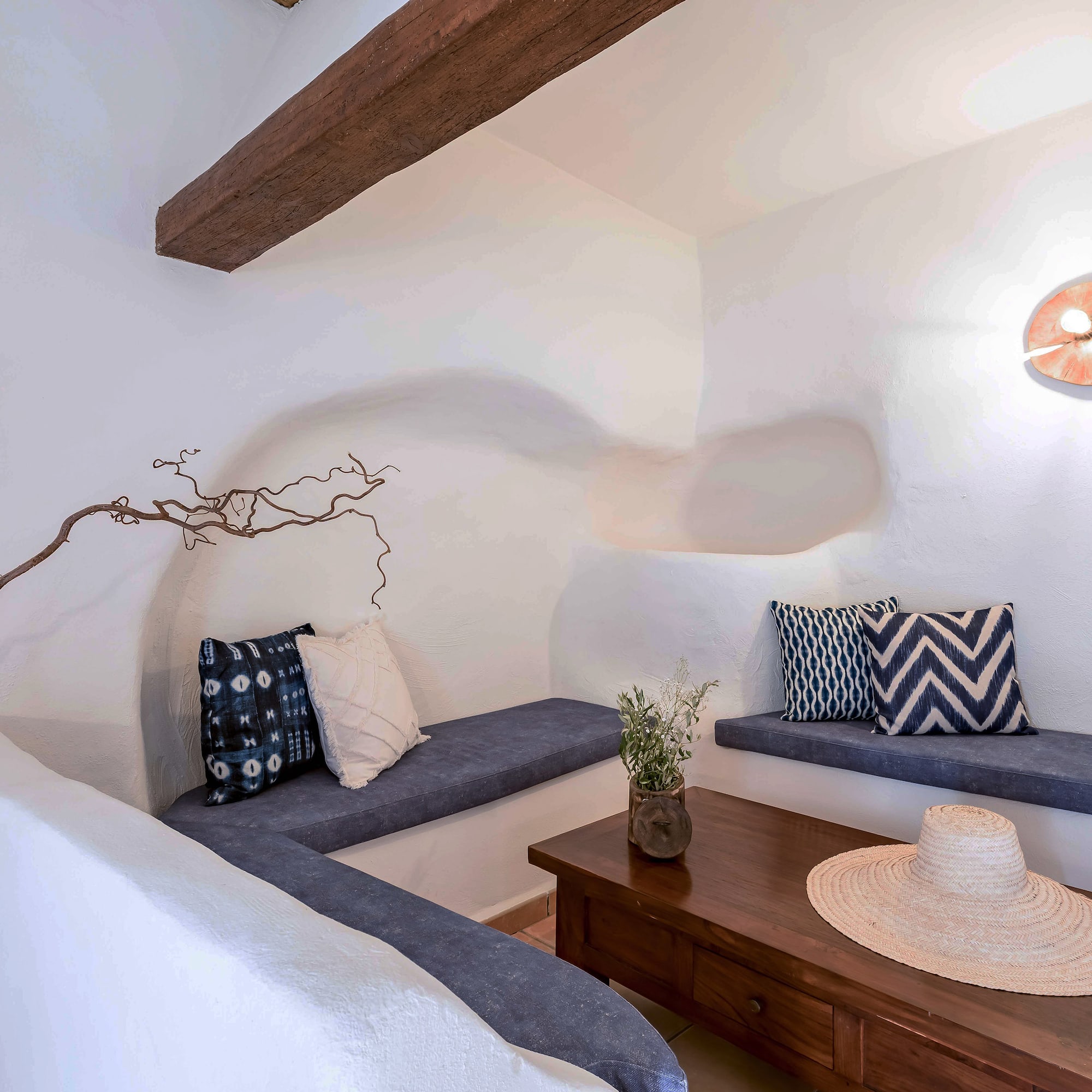 a room with a table and benches