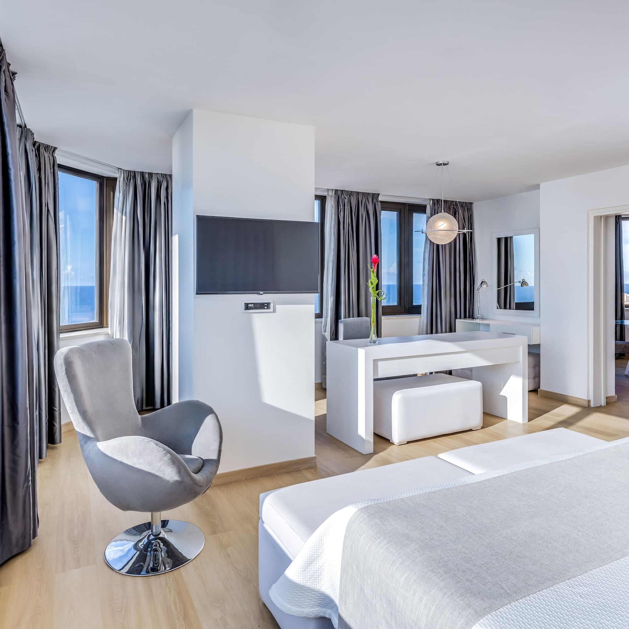 a room with a bed and a chair