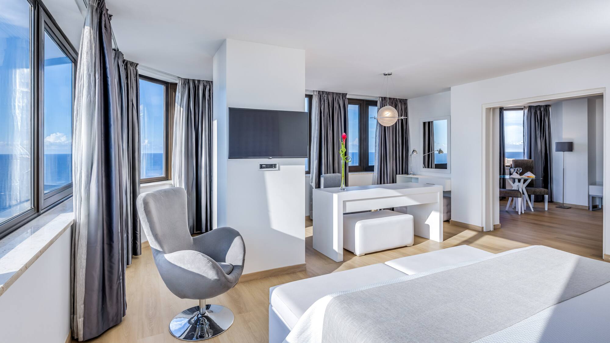 a room with a bed and a chair