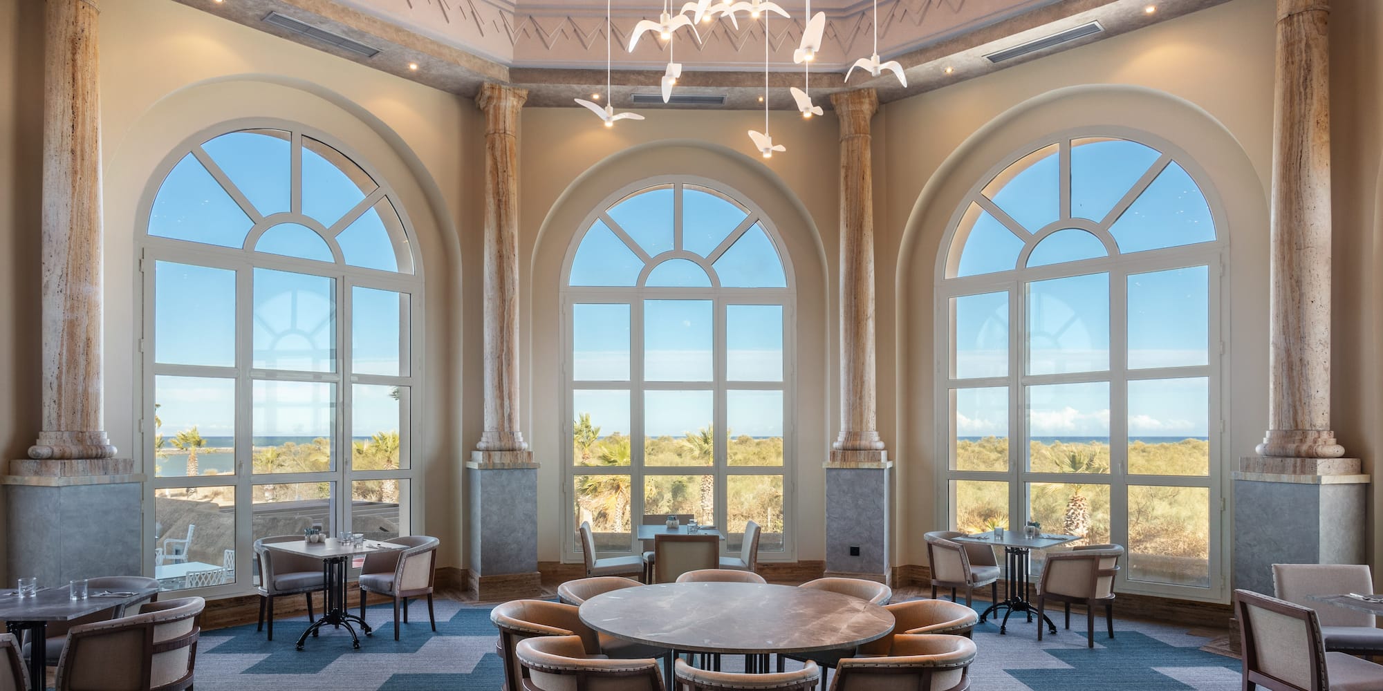 a room with tables and chairs