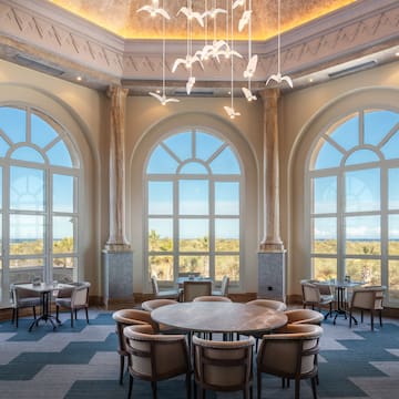 a room with tables and chairs