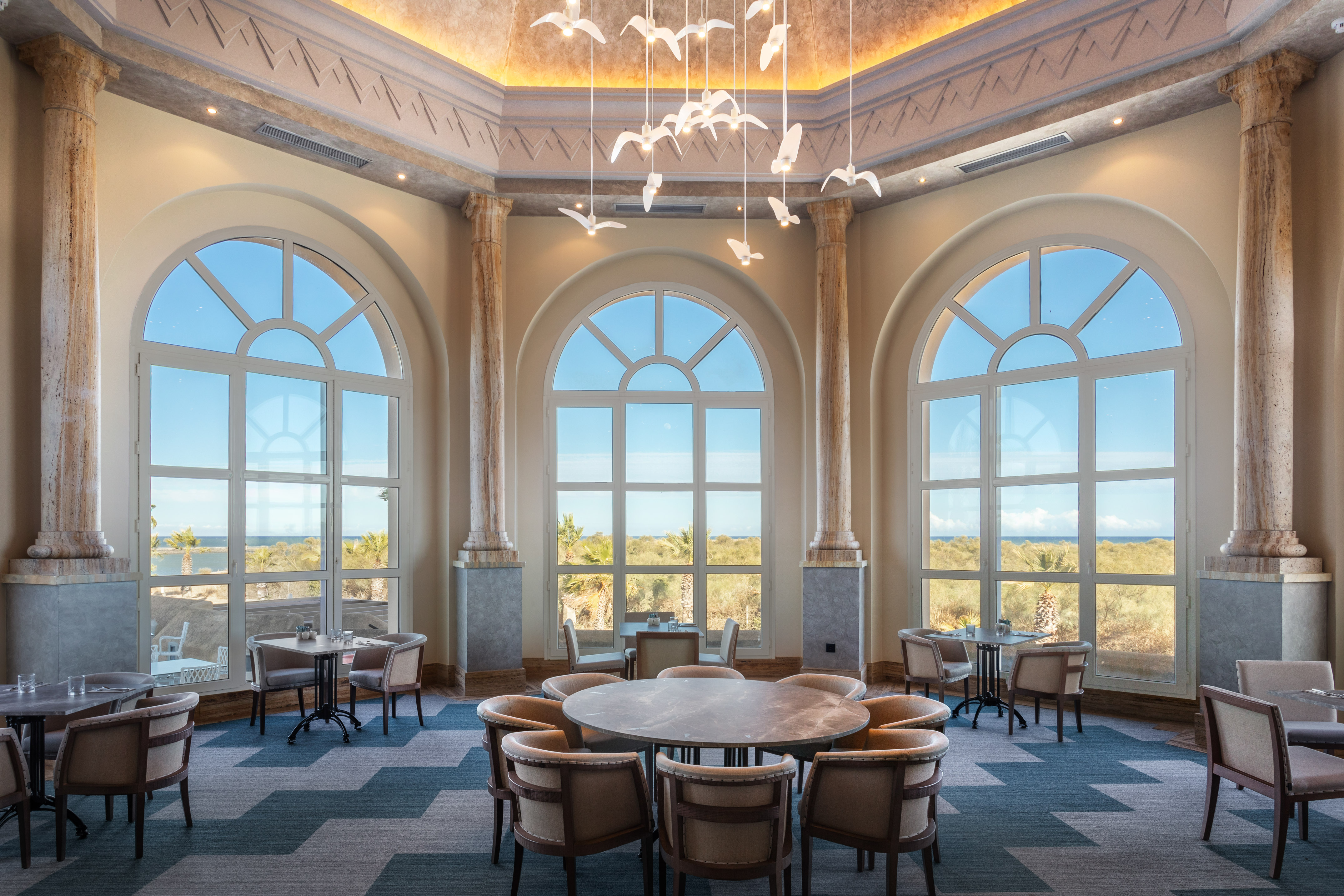 a room with tables and chairs