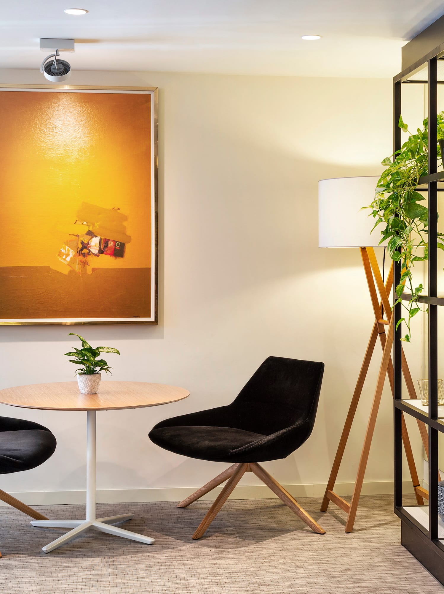 a room with a table and chairs