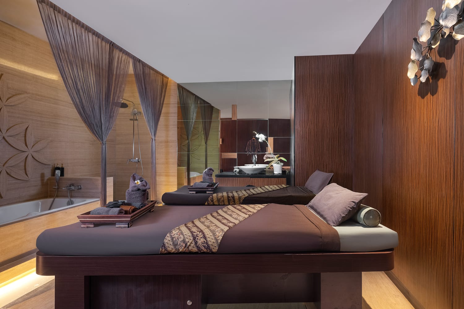 a room with two beds and a shower