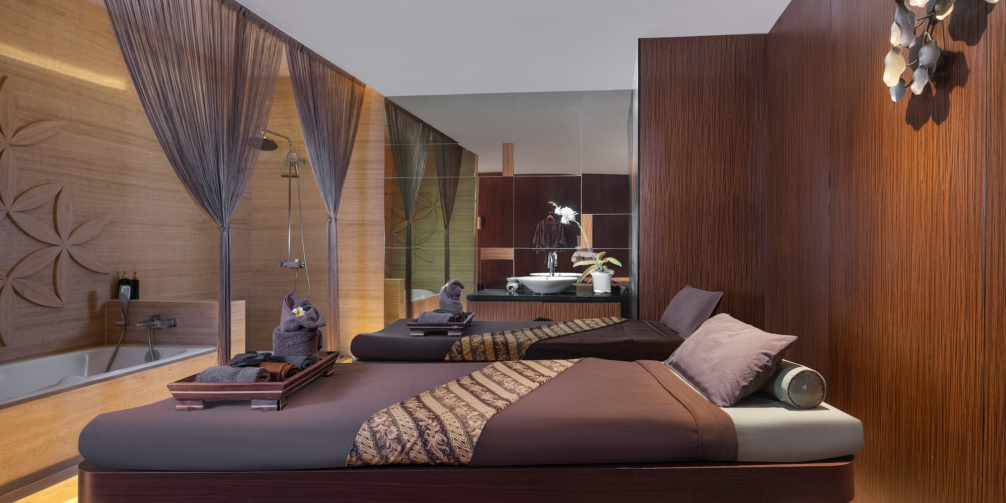 a room with two beds and a shower