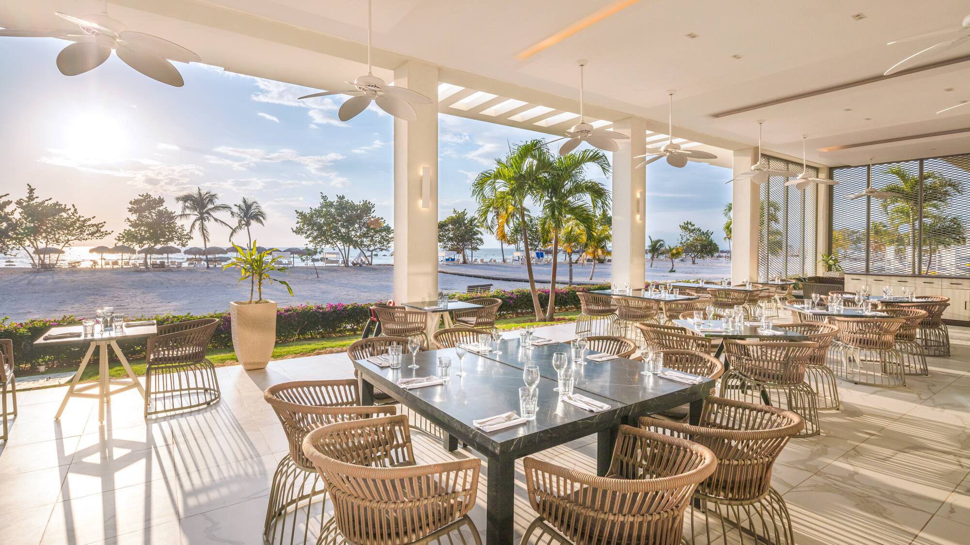 a large outdoor dining area with tables and chairs