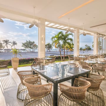 a large outdoor dining area with tables and chairs