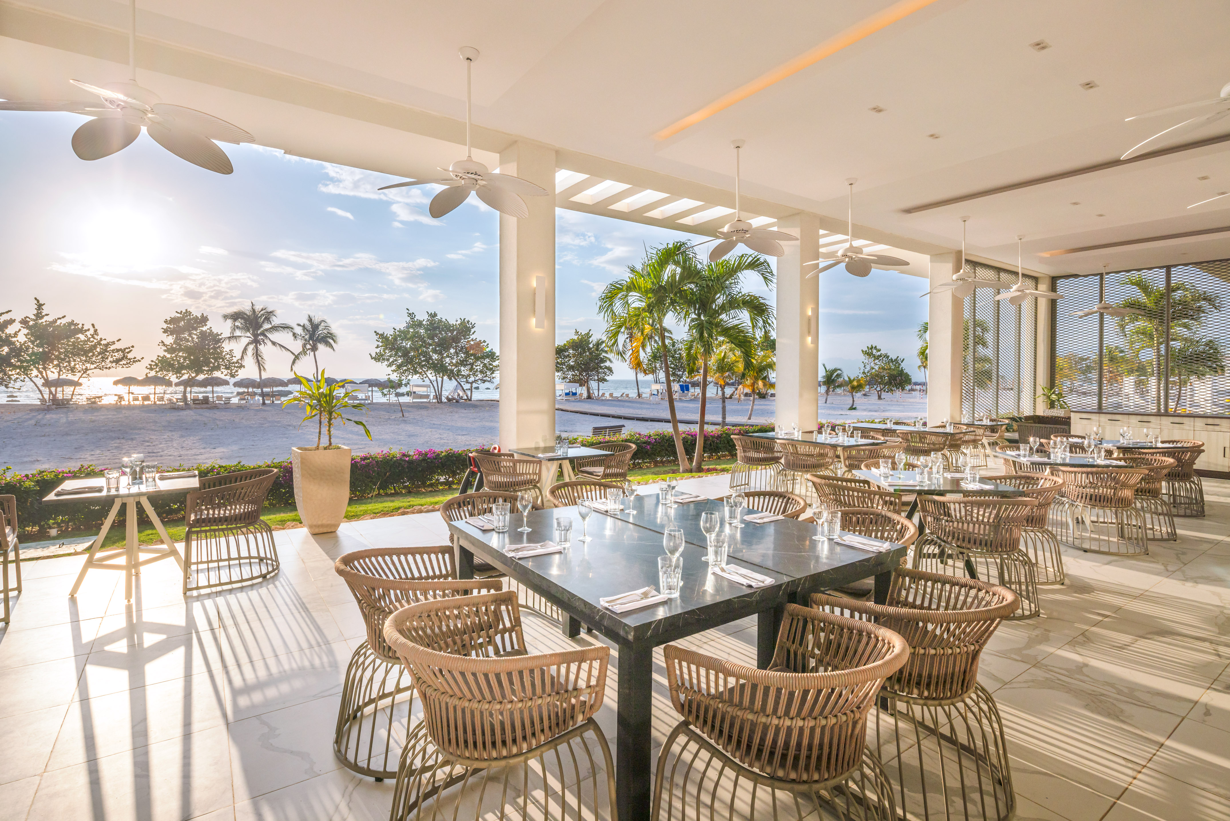 a large outdoor dining area with tables and chairs