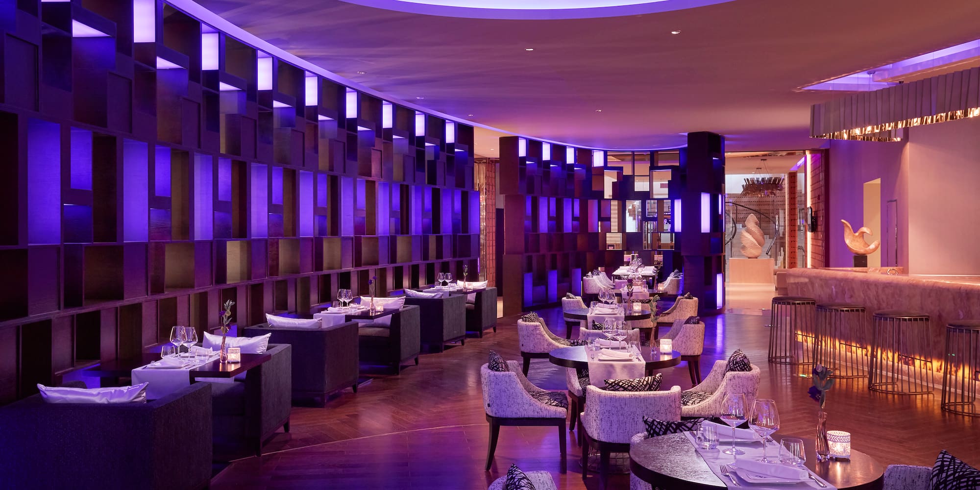 a room with tables and chairs