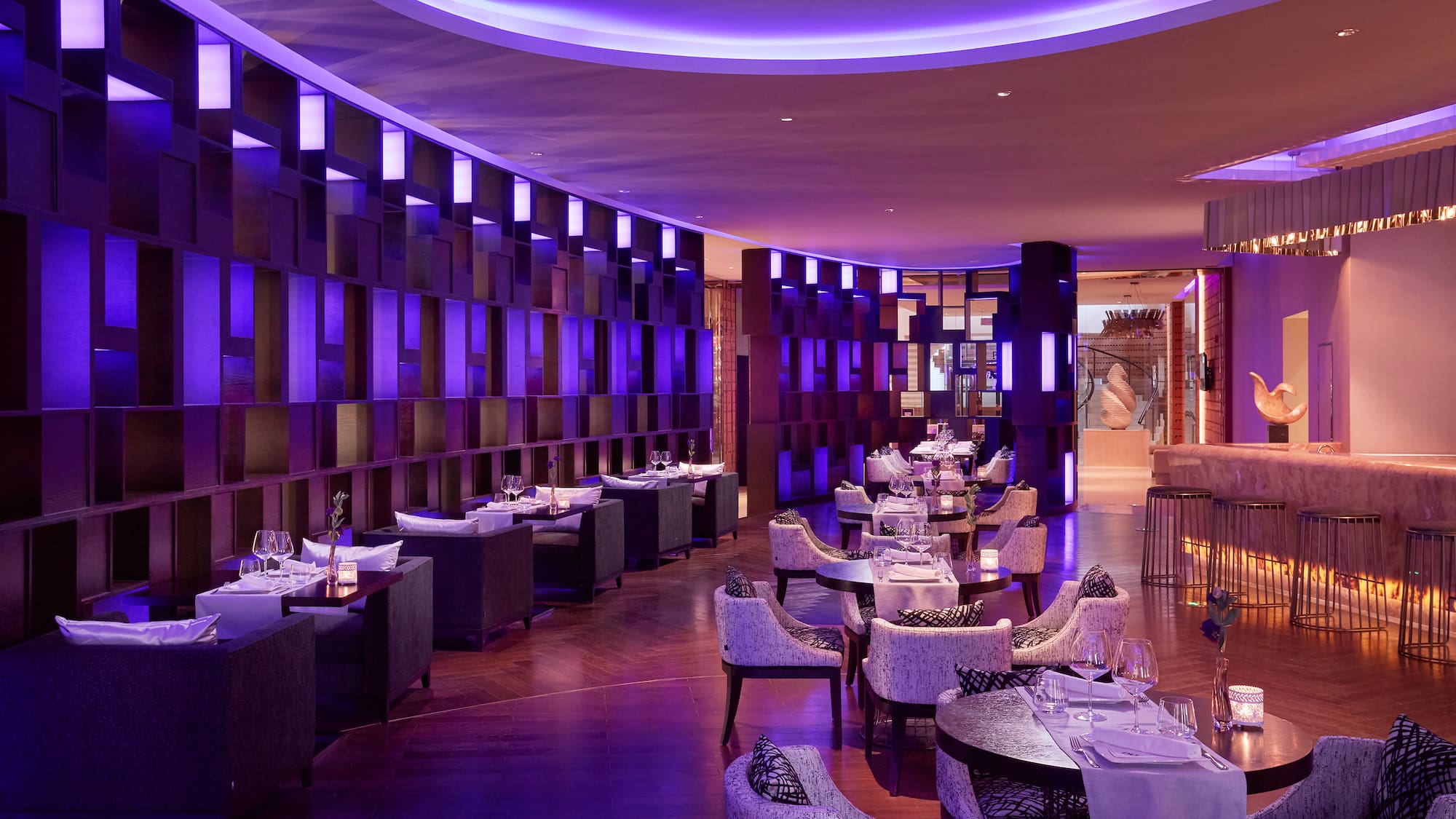 a room with tables and chairs