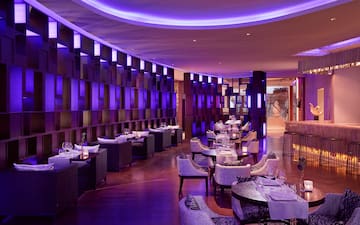 a room with tables and chairs