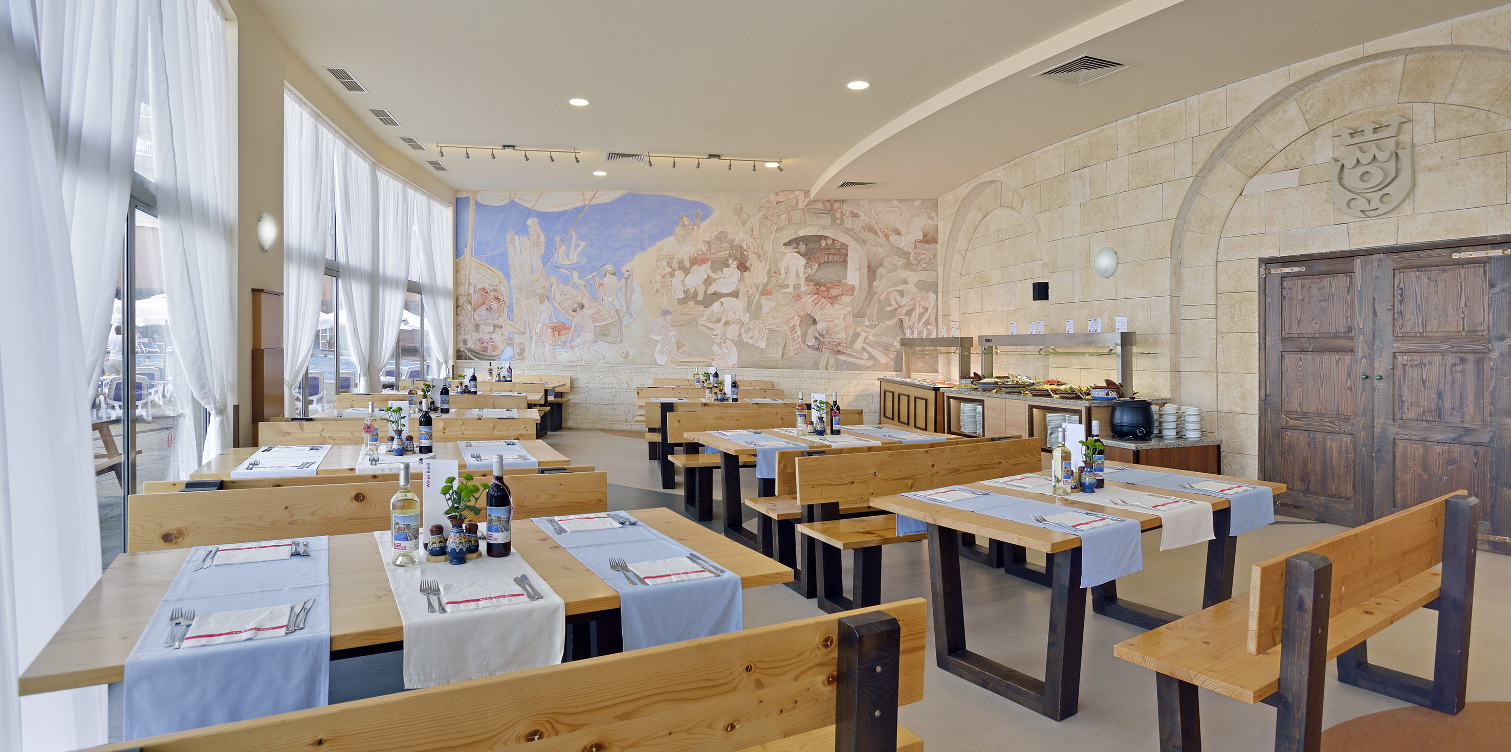 a room with tables and chairs