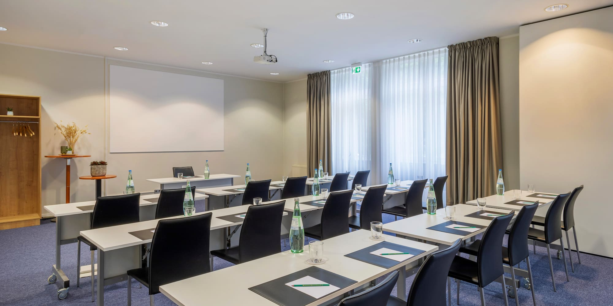 a room with tables and chairs