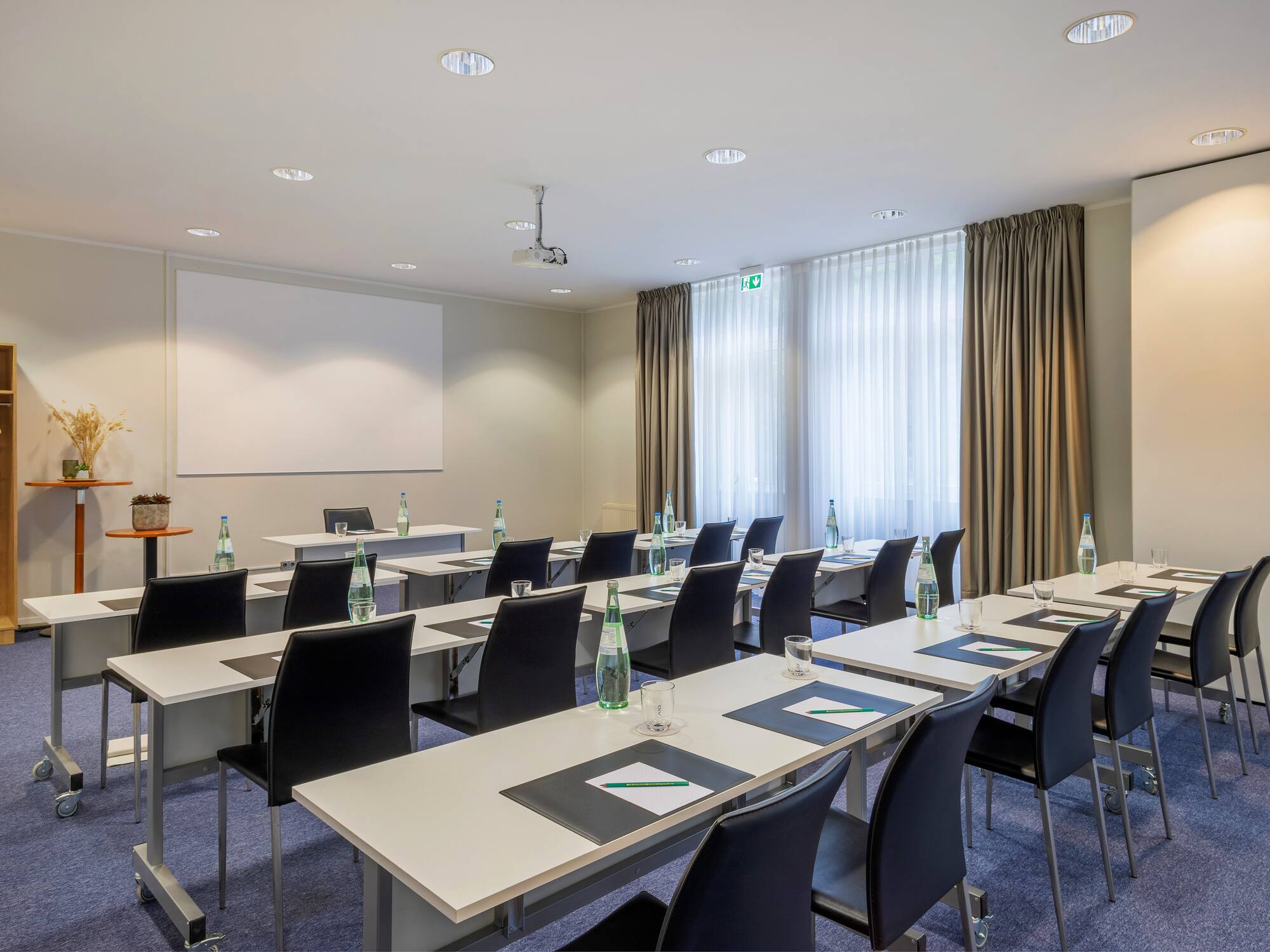 a room with tables and chairs