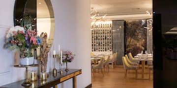 a room with tables and chairs