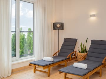 a lounge chairs in a room