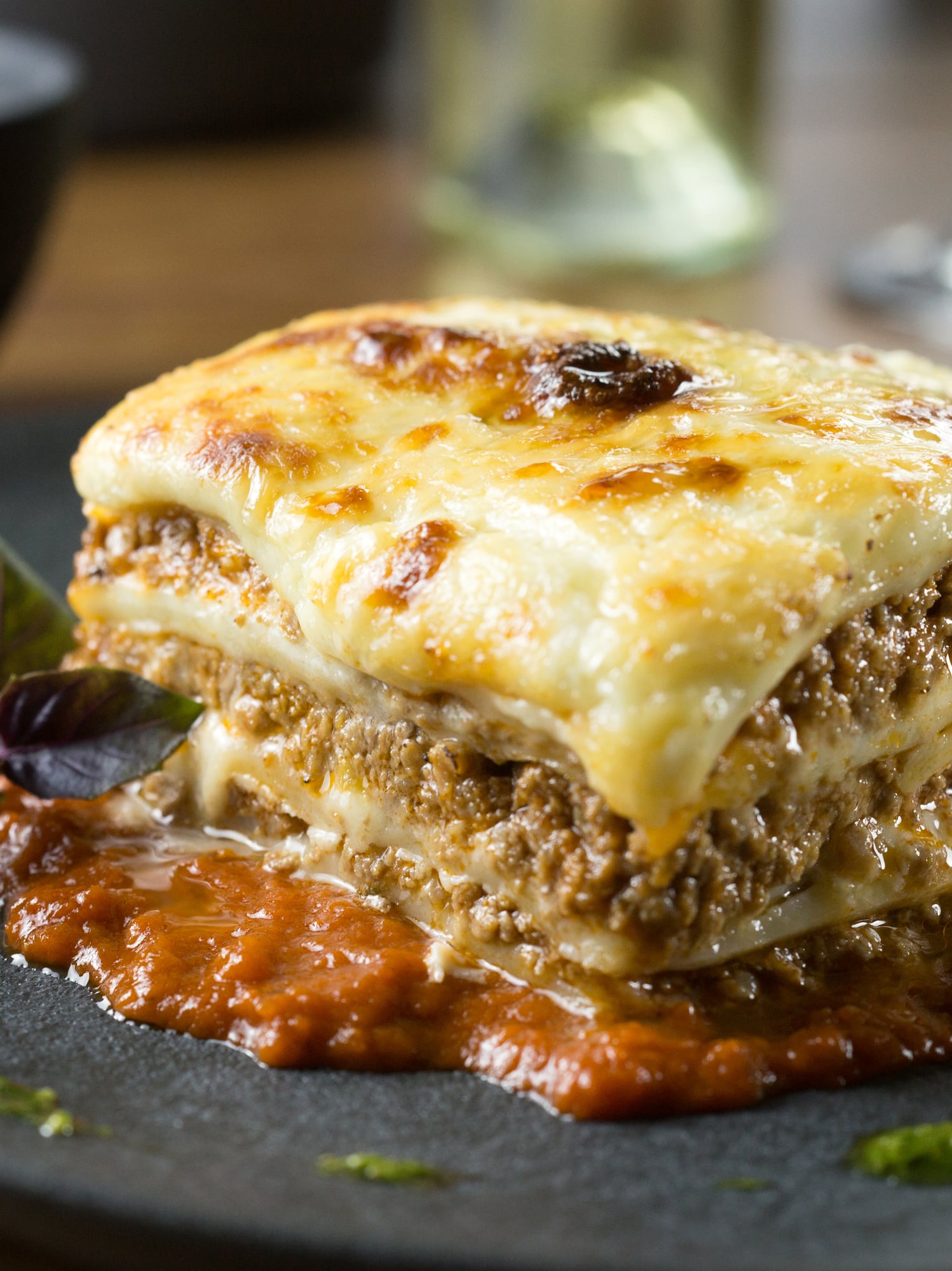 a plate of lasagna on a table