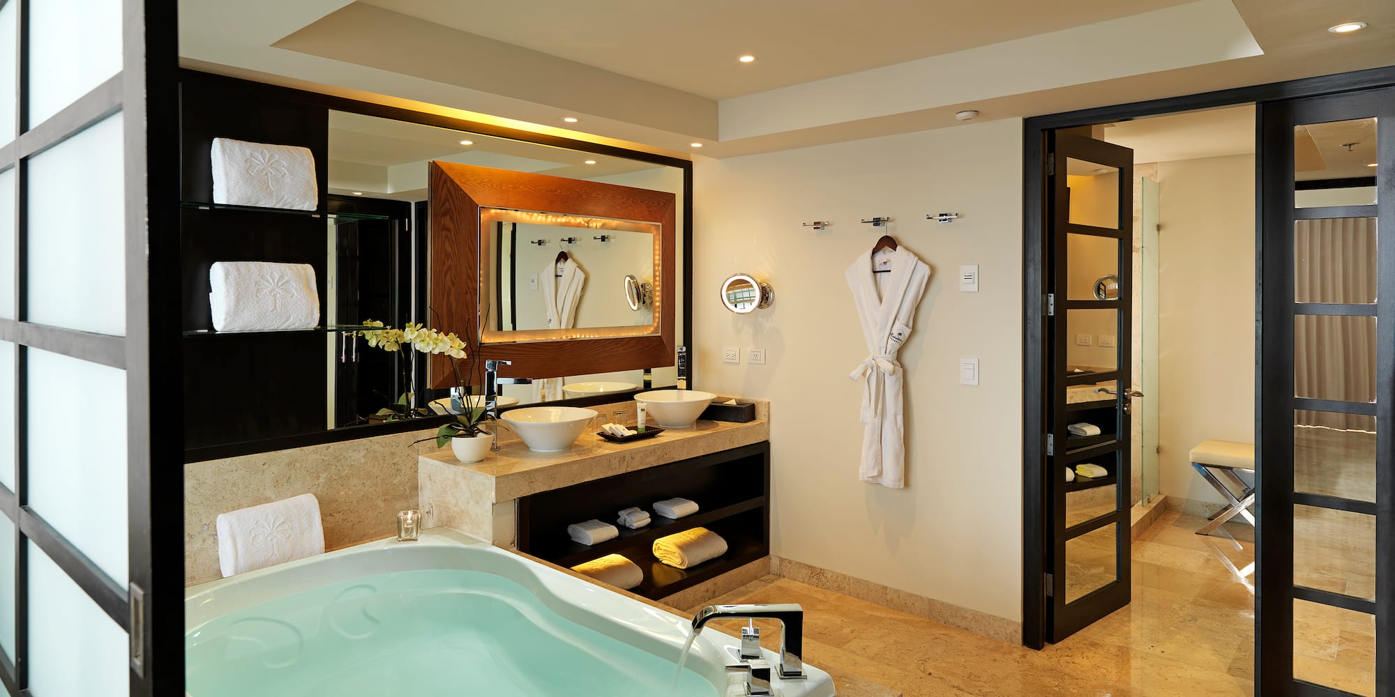 a bathroom with a bathtub and a mirror