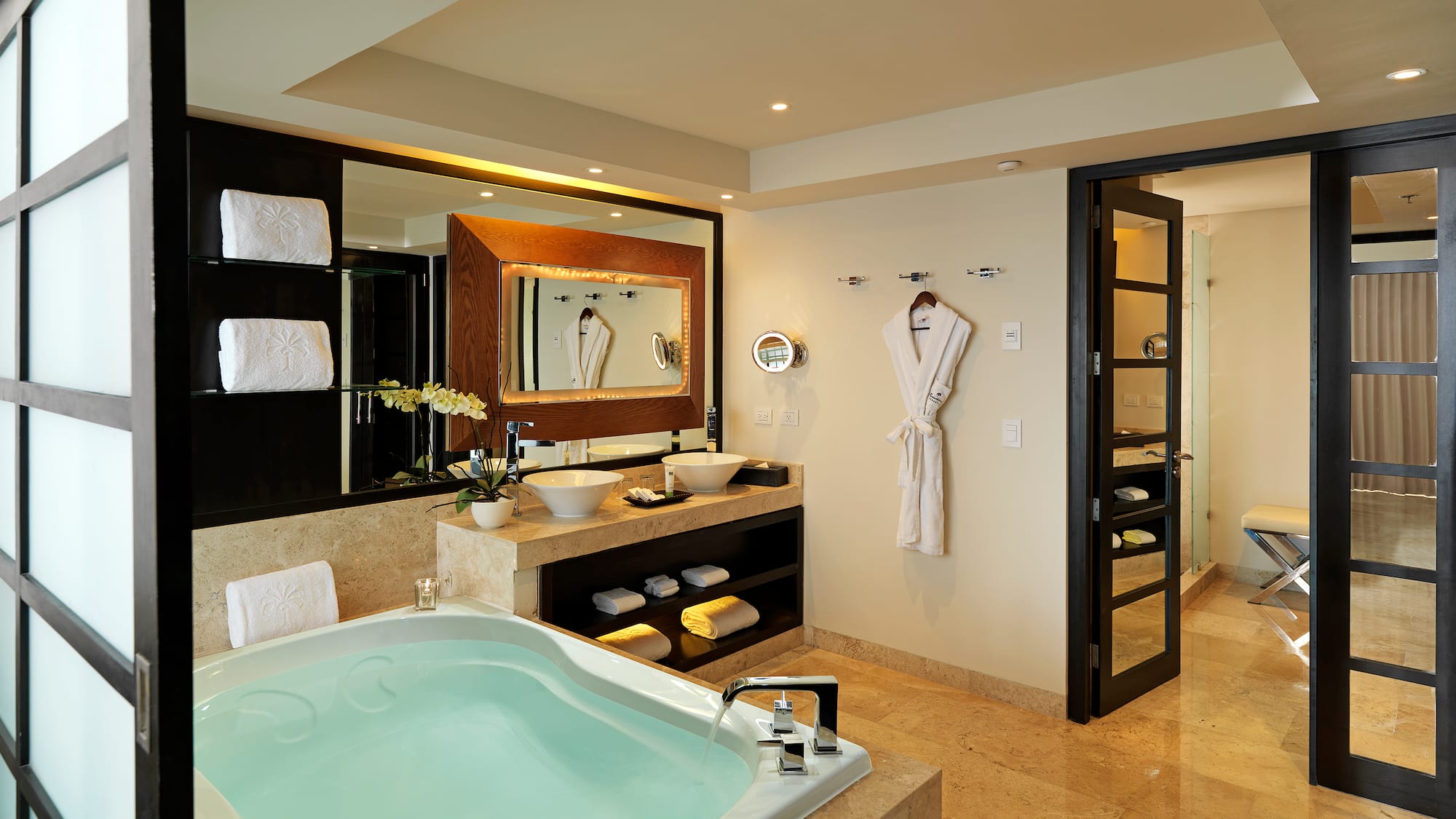 a bathroom with a bathtub and a mirror