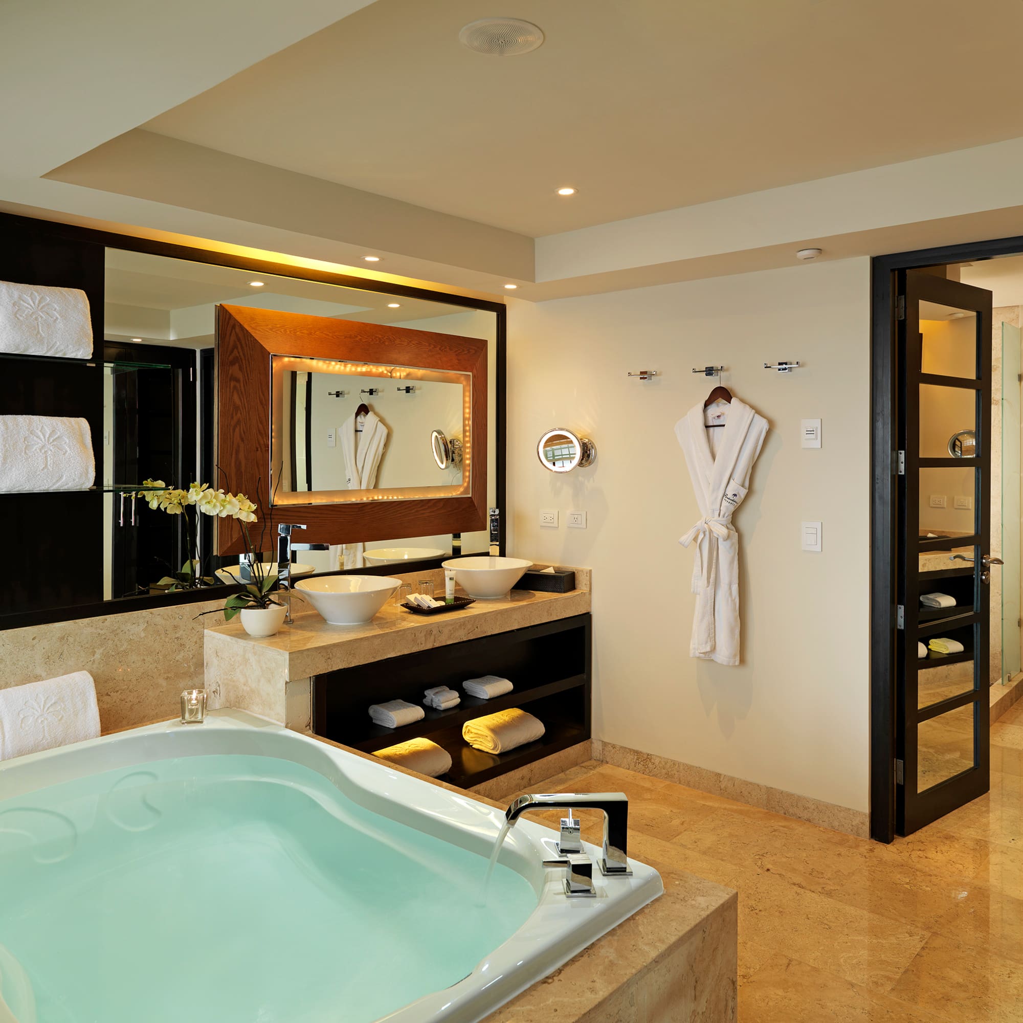 a bathroom with a bathtub and a mirror