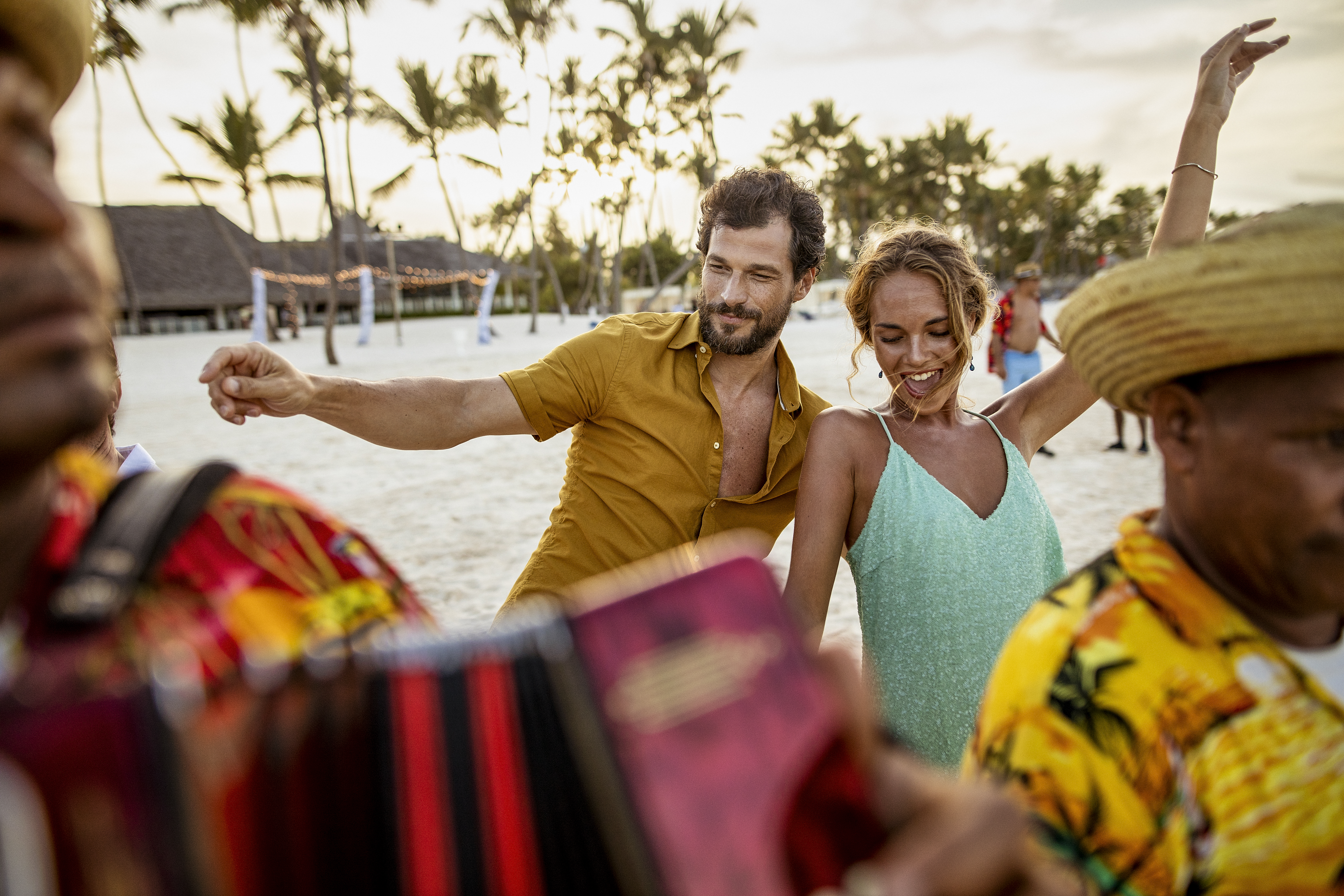 a group of people on a beach