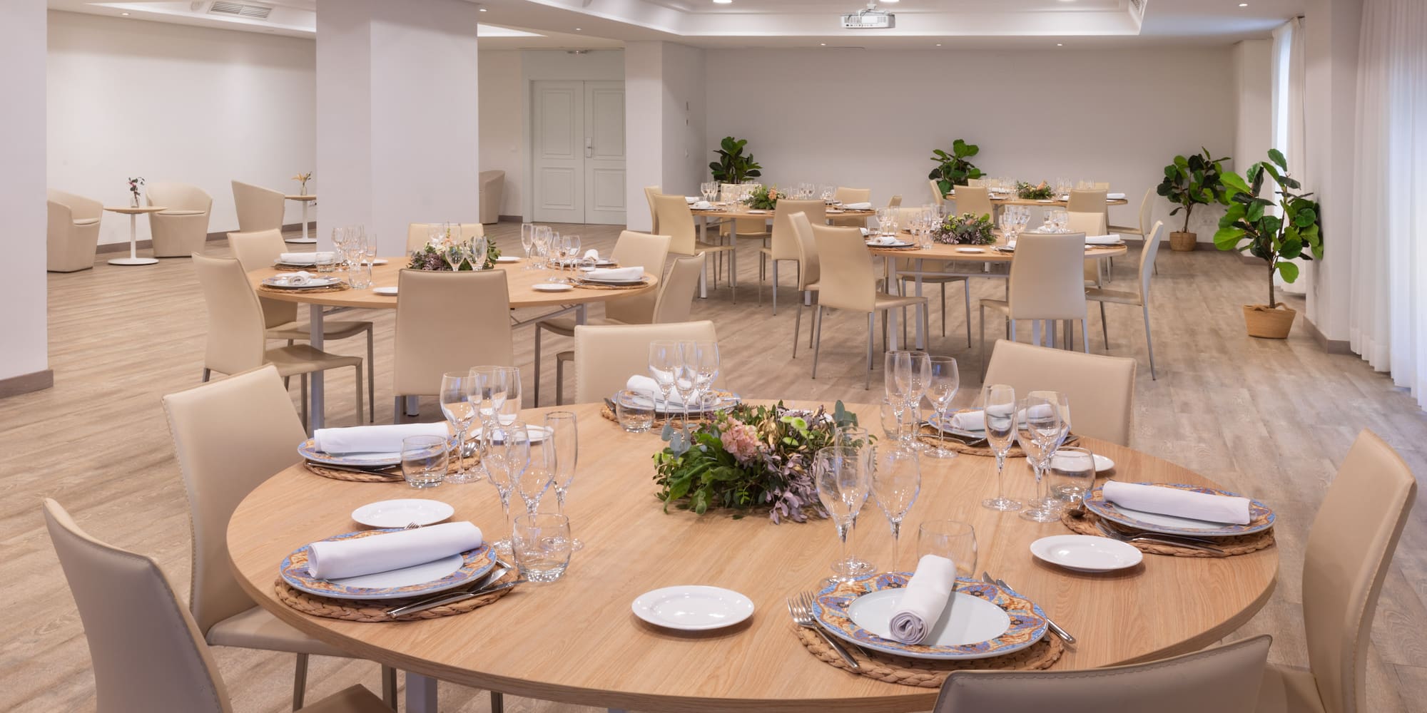 a room with tables and chairs