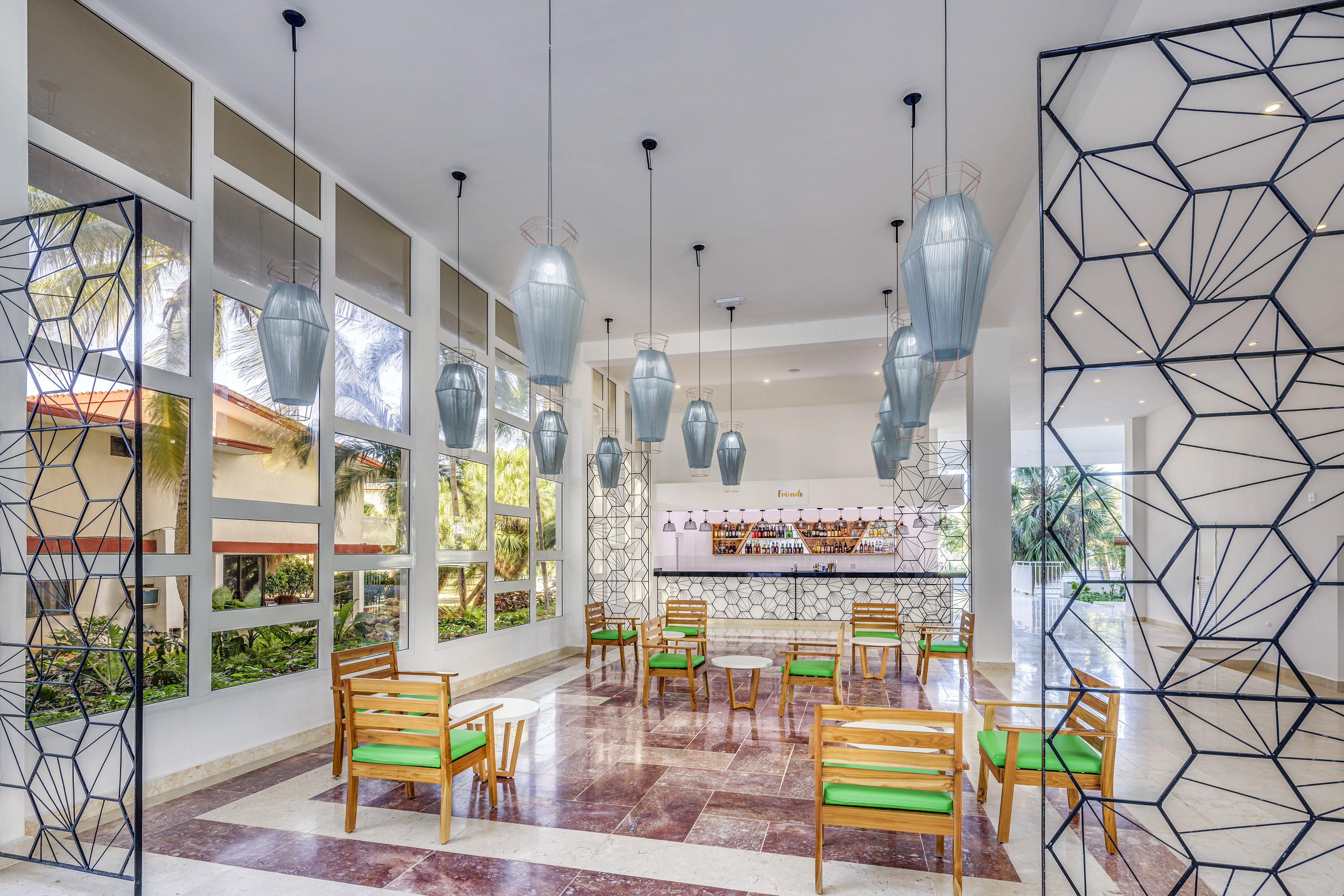 a room with chairs and tables