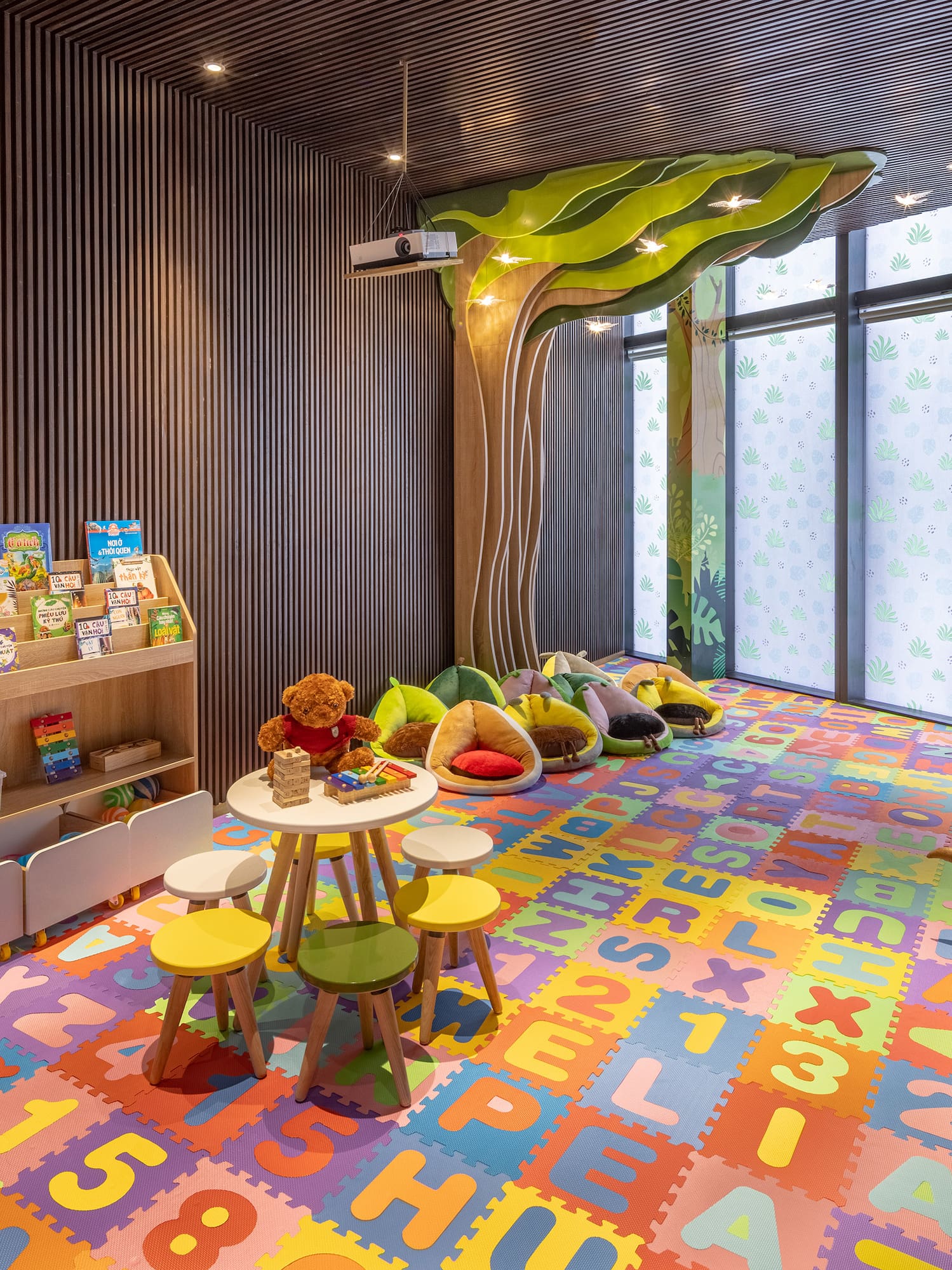 a room with colorful carpet and toys